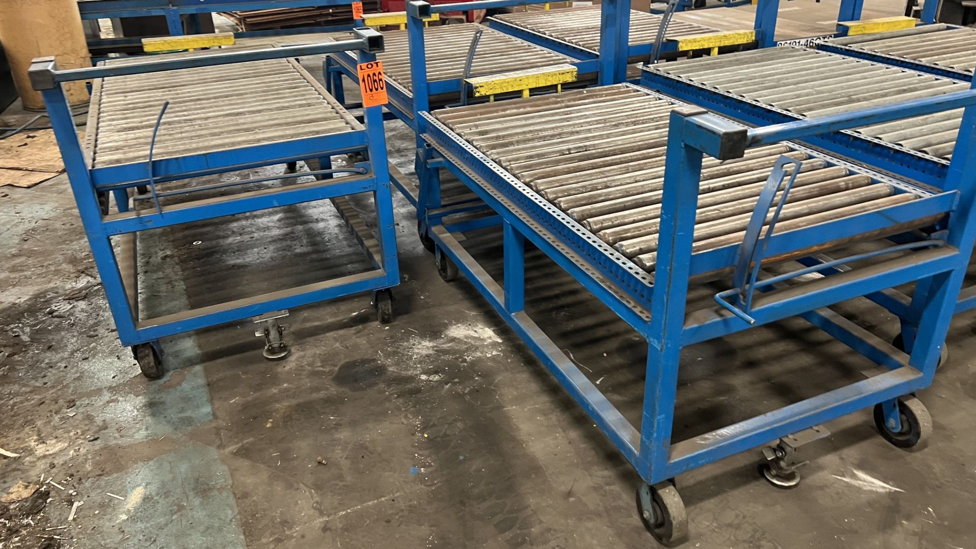 (3) Sections of mobile steel frame manual roller conveyor carts on casters w/ handle, foot lock and