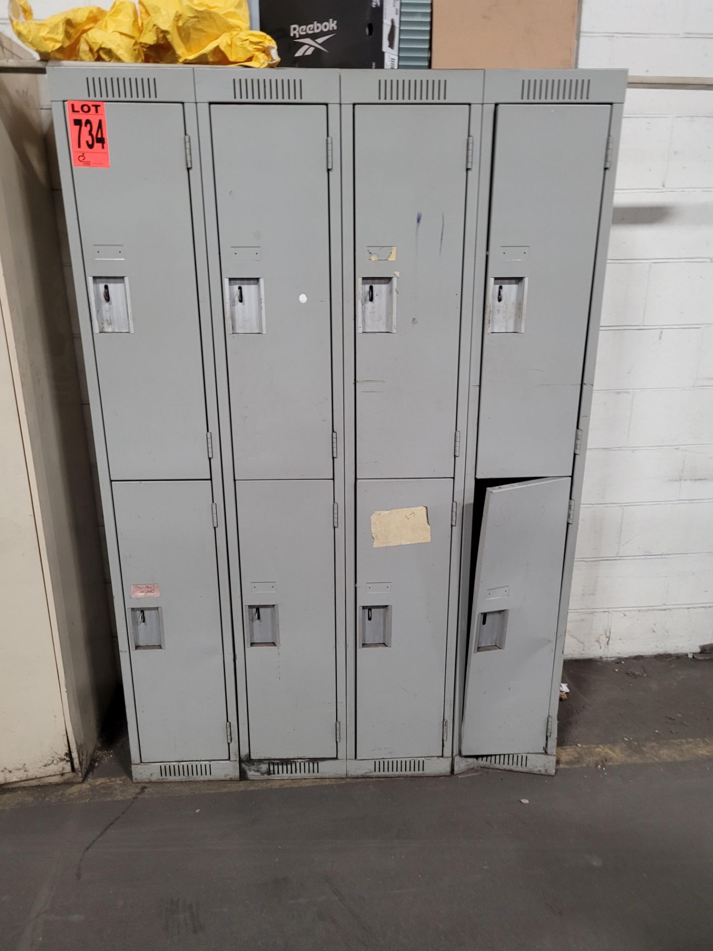 8-door stacked lockers, damaged corner