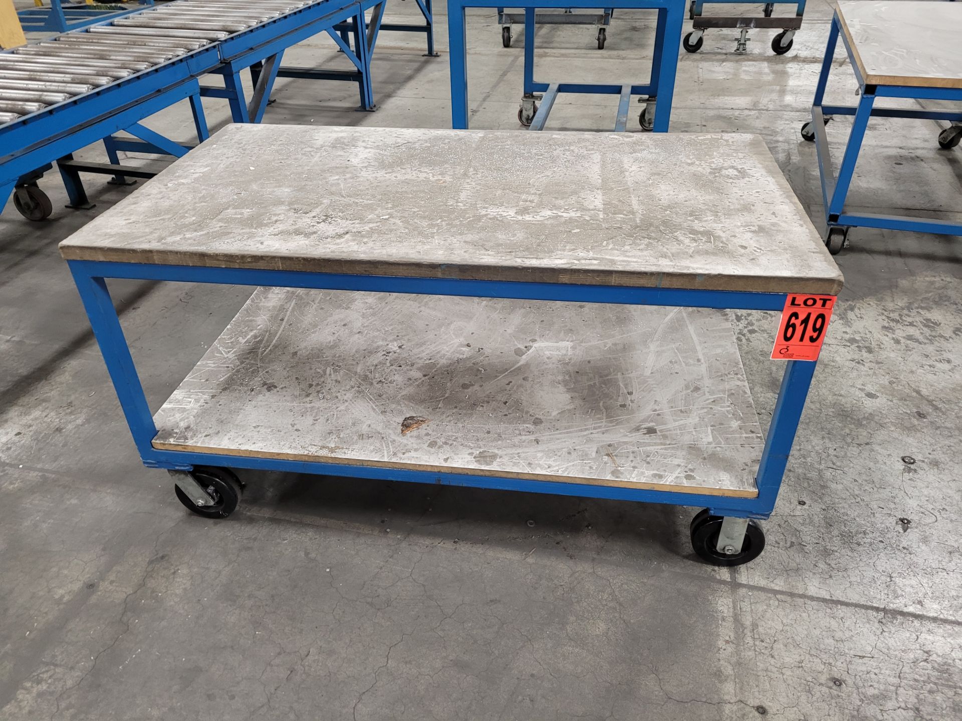 Mobile steel frame 2-level worktable on casters w/plywood surfaces