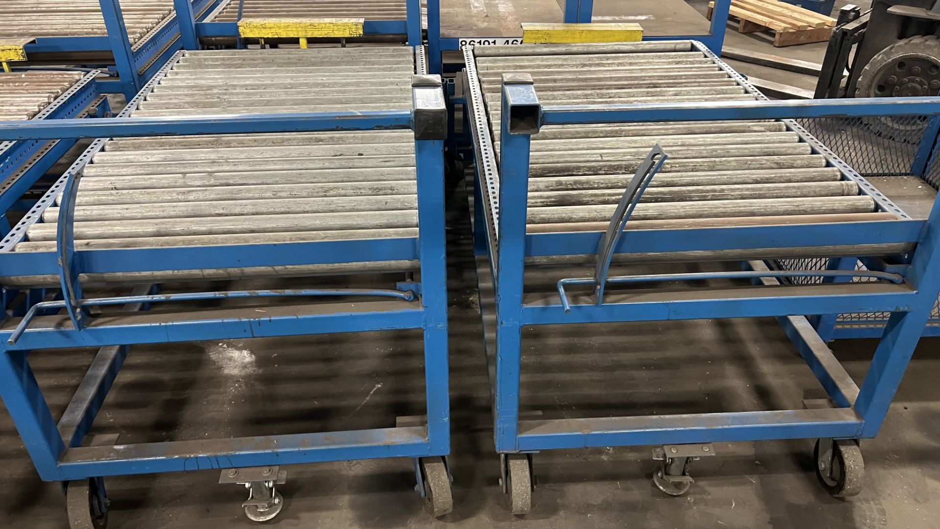 (3) Sections of mobile steel frame manual roller conveyor carts on casters w/ handle, foot lock and