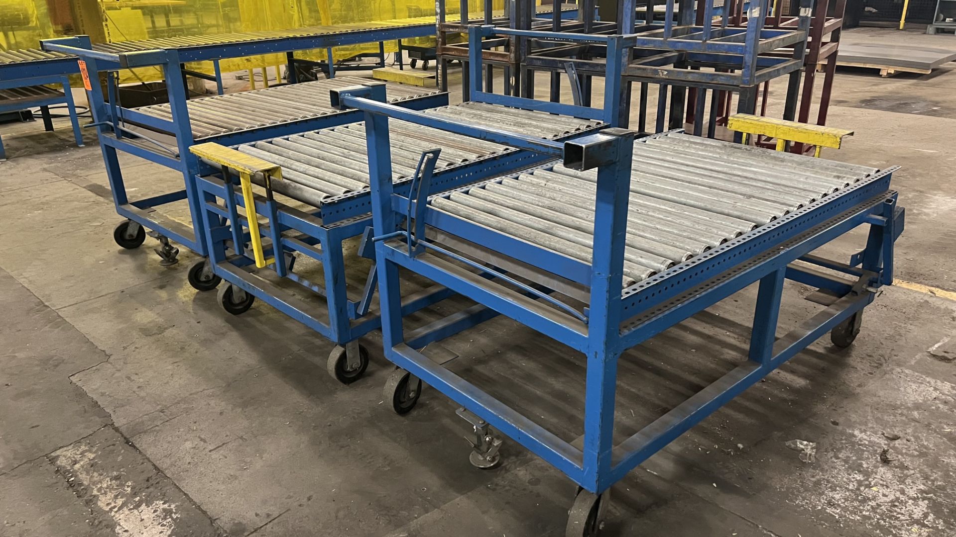 Lot of (3) mobile roller conveyors on casters w/ foot lock, adjustable bumper bars, handles - Image 2 of 3