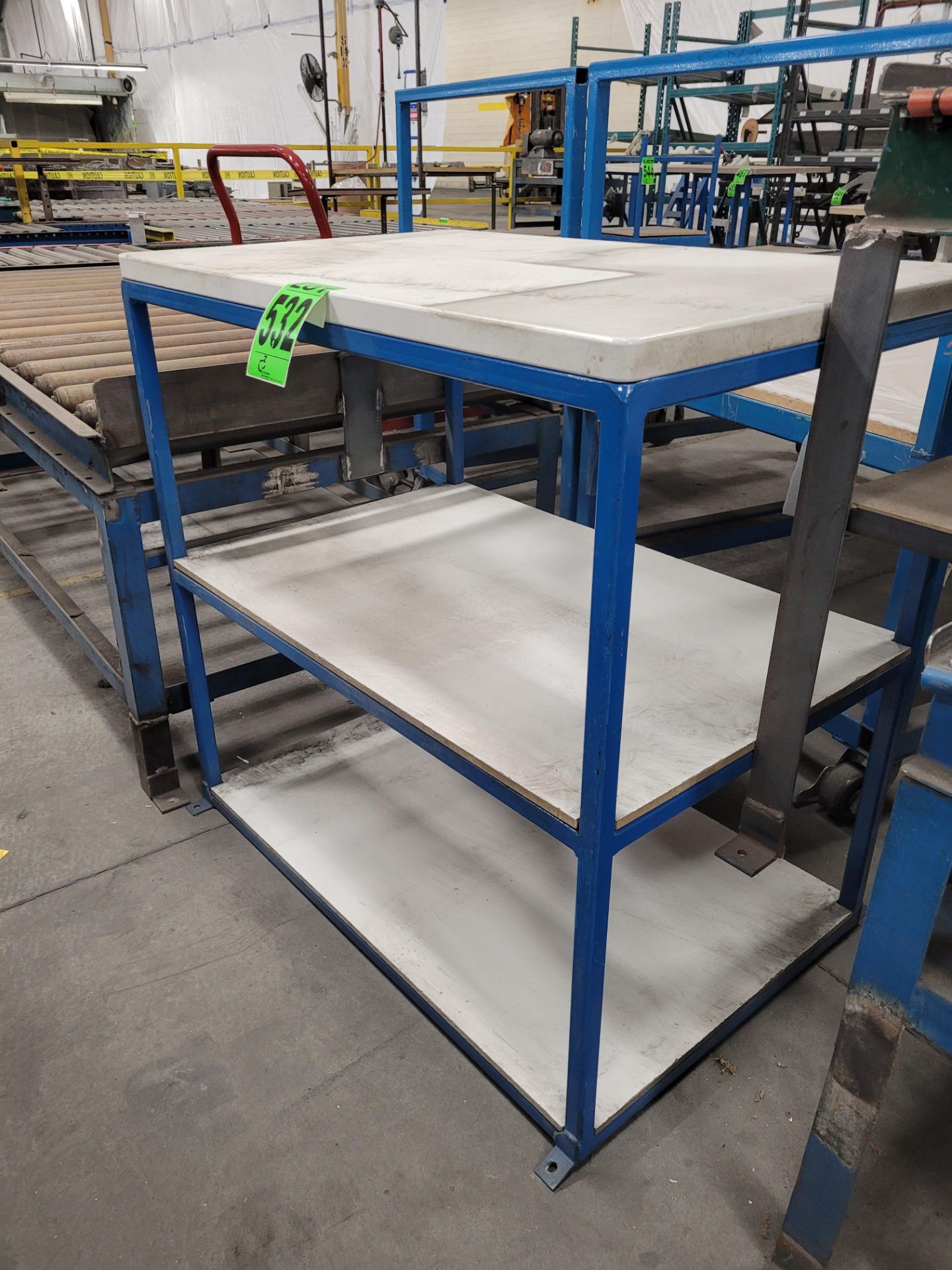 3-level steel frame shelving unit, plywood/composite surfaces