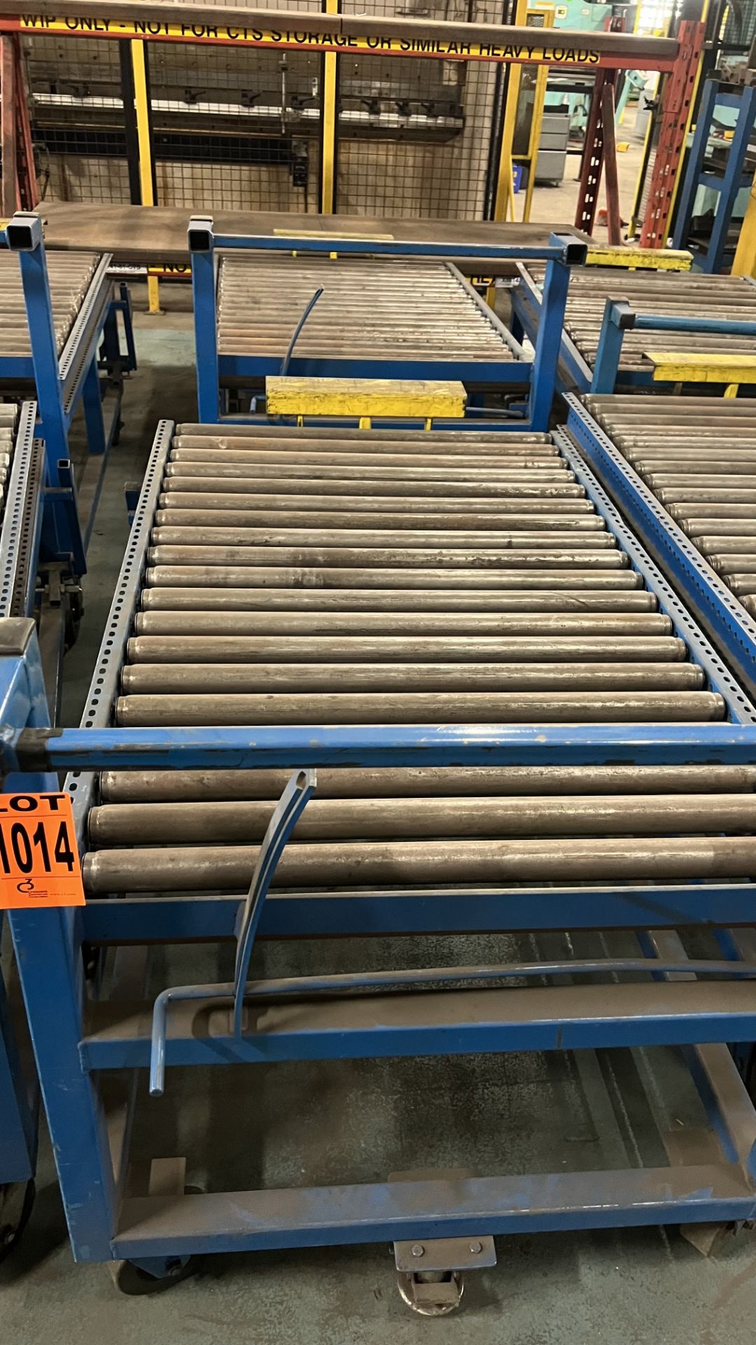 Lot of (2) 5' Steel frame mobile manual conveyors w/ locking foot, handles, adjustable bumper bars