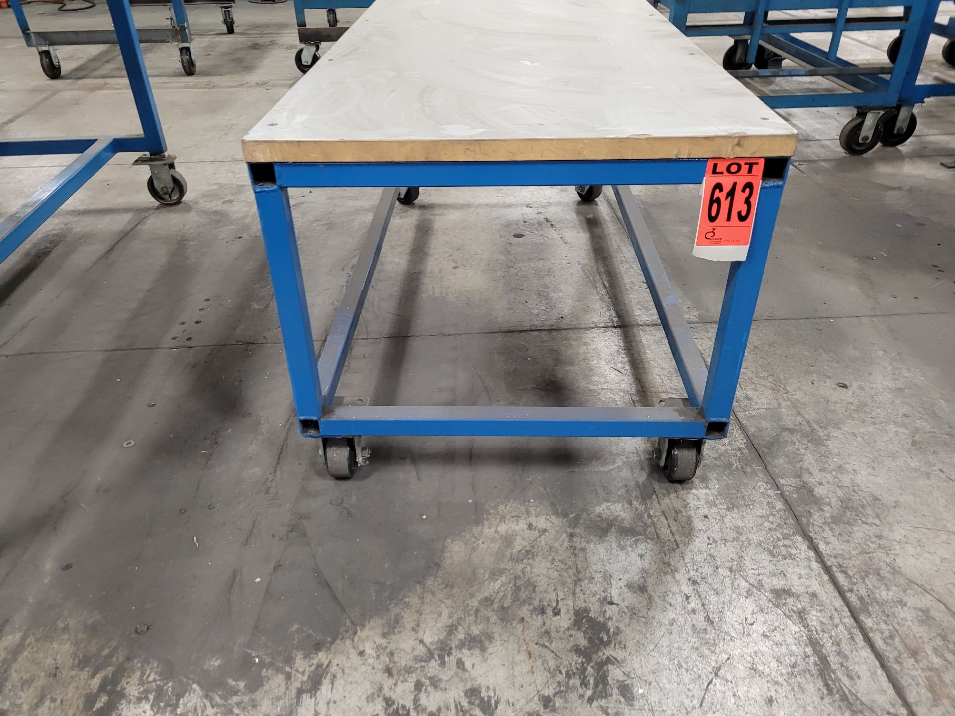 Mobile steel frame worktable on casters w/plywood surface - Image 3 of 4