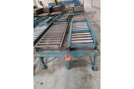 Section of double inclined manual roller conveyor w/ folding extension, 1'  space between conveyor