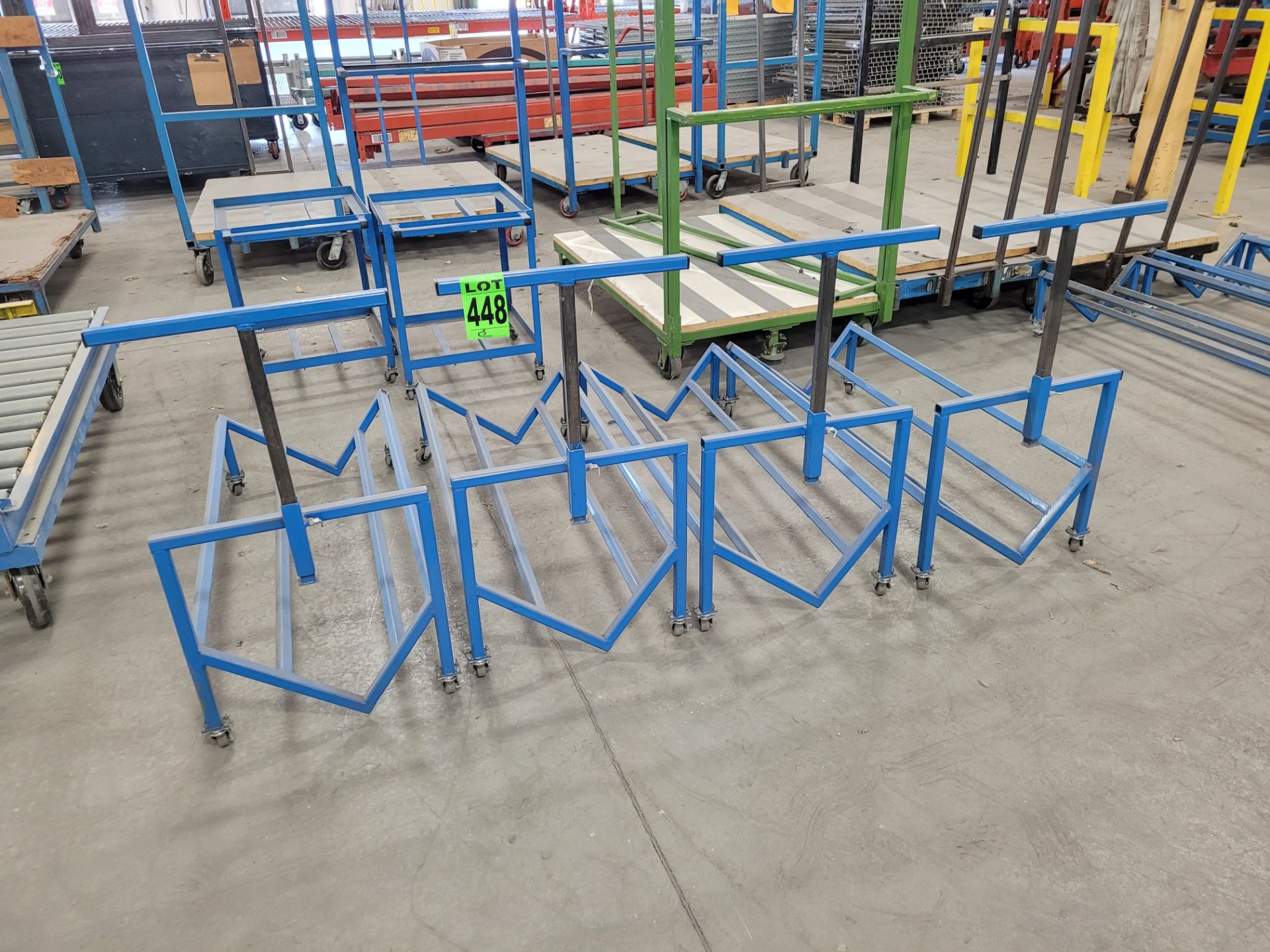 Lot of (4) steel frame , V-shape carts on casters w/ adjustable T-bar handle