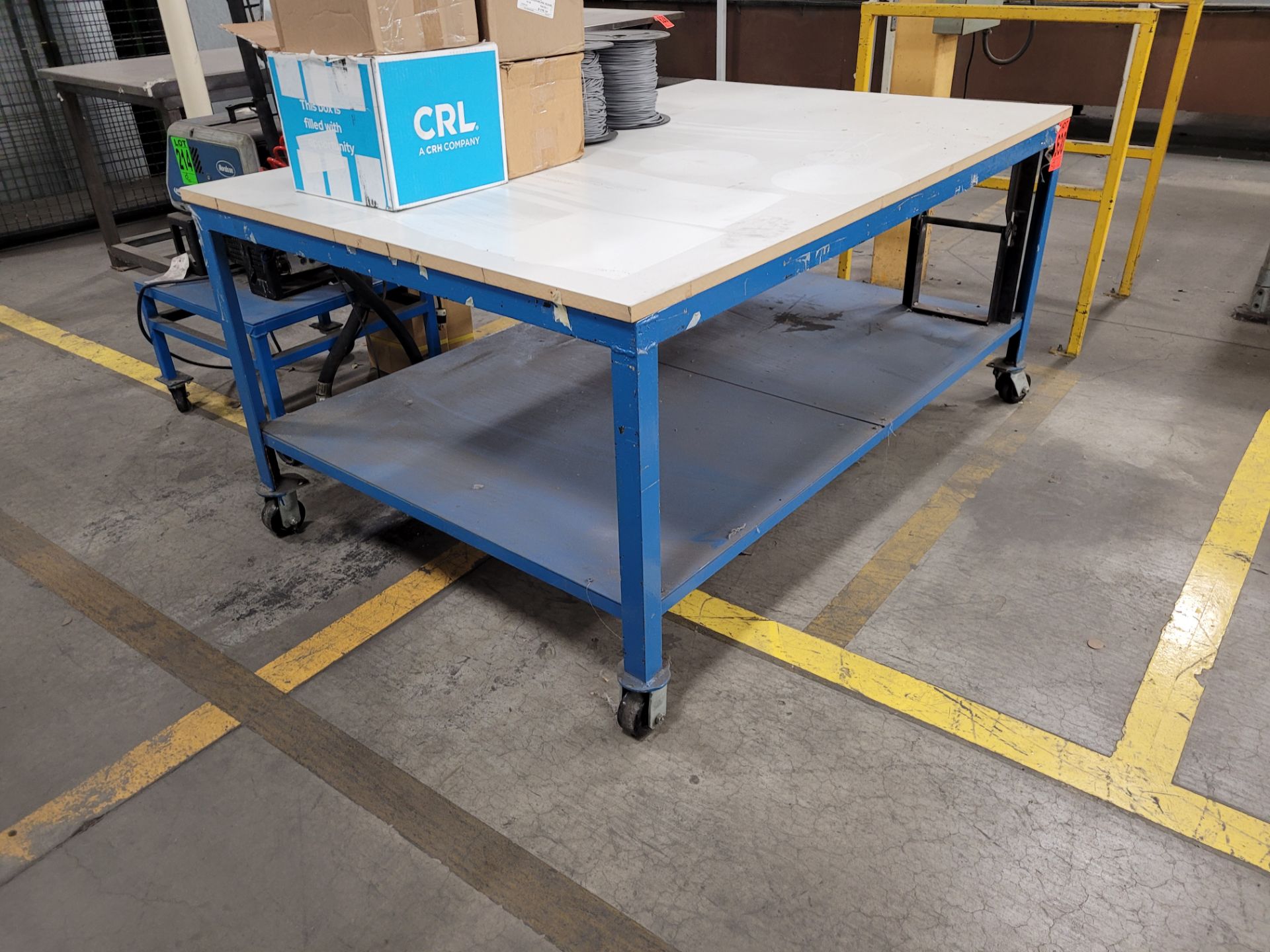 Mobile steel frame worktable on lockable casters w/plywood surface (no contents) - Image 3 of 3