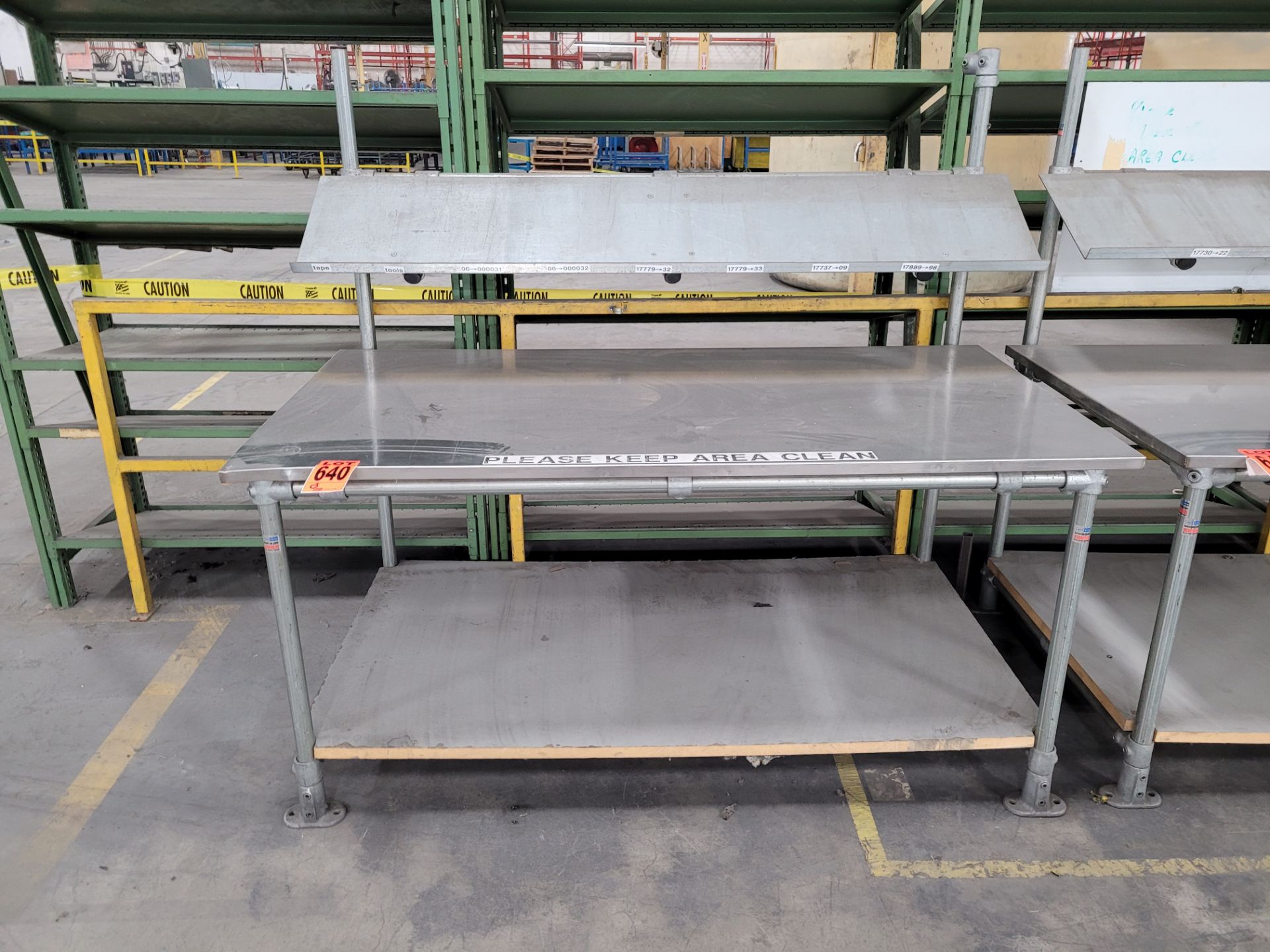 Stainless steel, galvanized steel and plywood worktable w/inclined overhead shelf