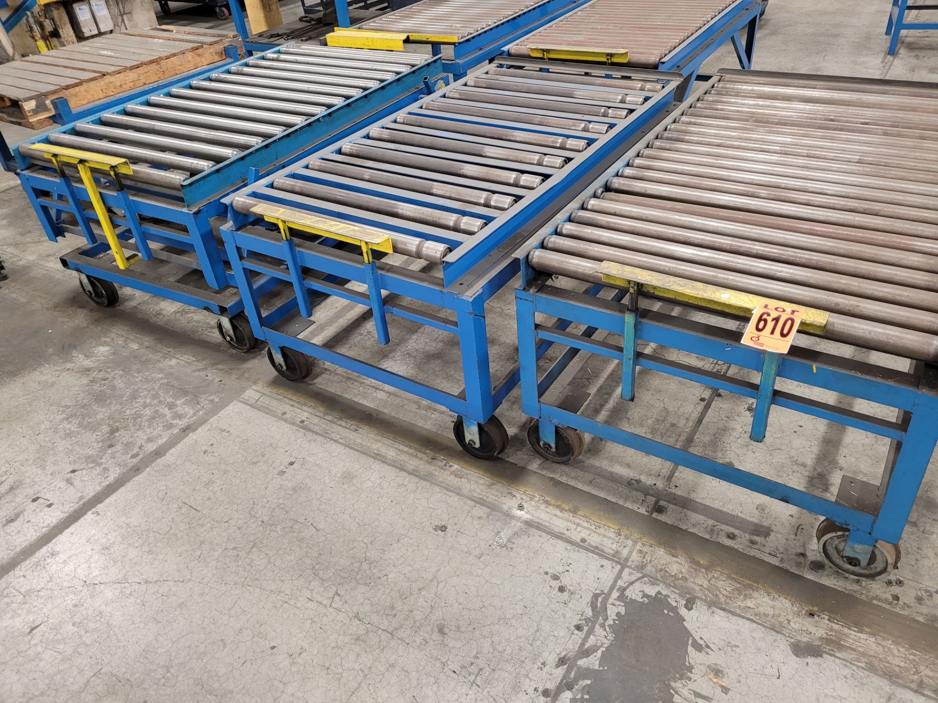 Lot of (3) Heavy-duty steel frame mobile roller conveyors, (2) casters + (2) steel rail wheels, w/ad