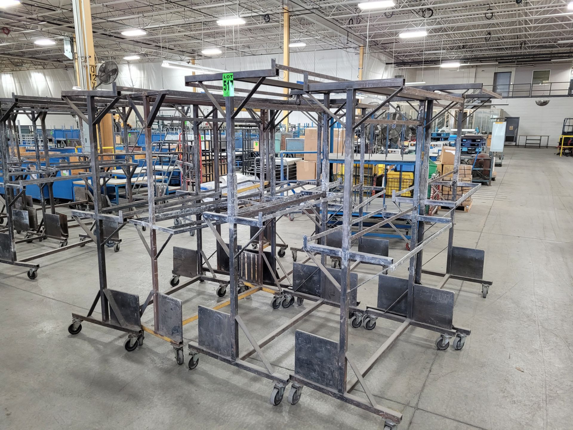 Lot of (8) mobile steel WIP racks, 2-level w/(4) 5' hanging racks, on casters