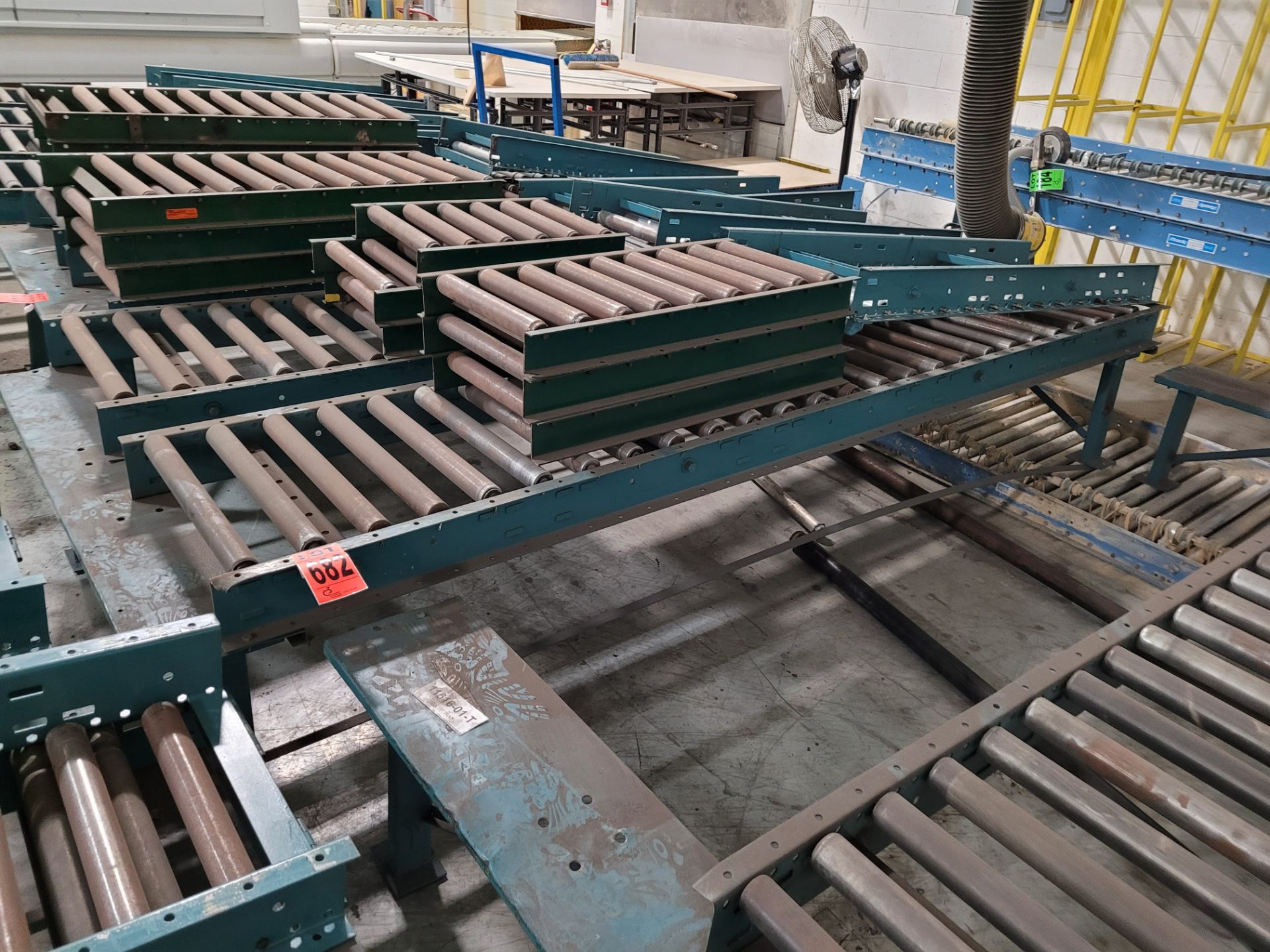 Section of double inclined manual roller conveyor w/ folding extension, 1' space between conveyors - Image 2 of 3