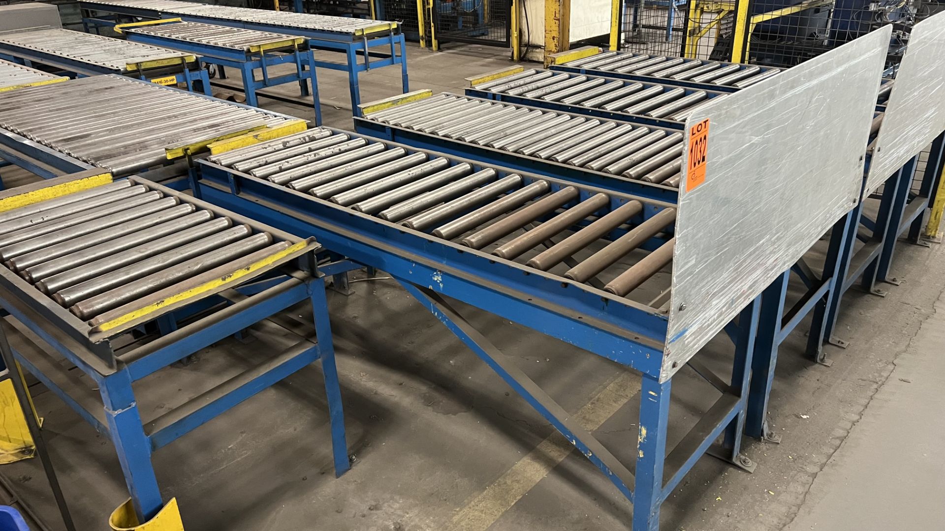 Lot of (5) steel fixed frame manual roller conveyors w/ adjustbale bumper bars, backboards, (4) 6',