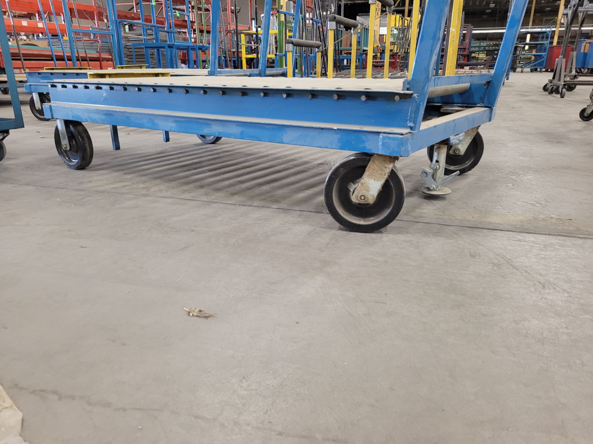 Heavy-duty steel roller conveyor on casters, w/ floor lock, handle, adjustable height backstop - Image 2 of 2