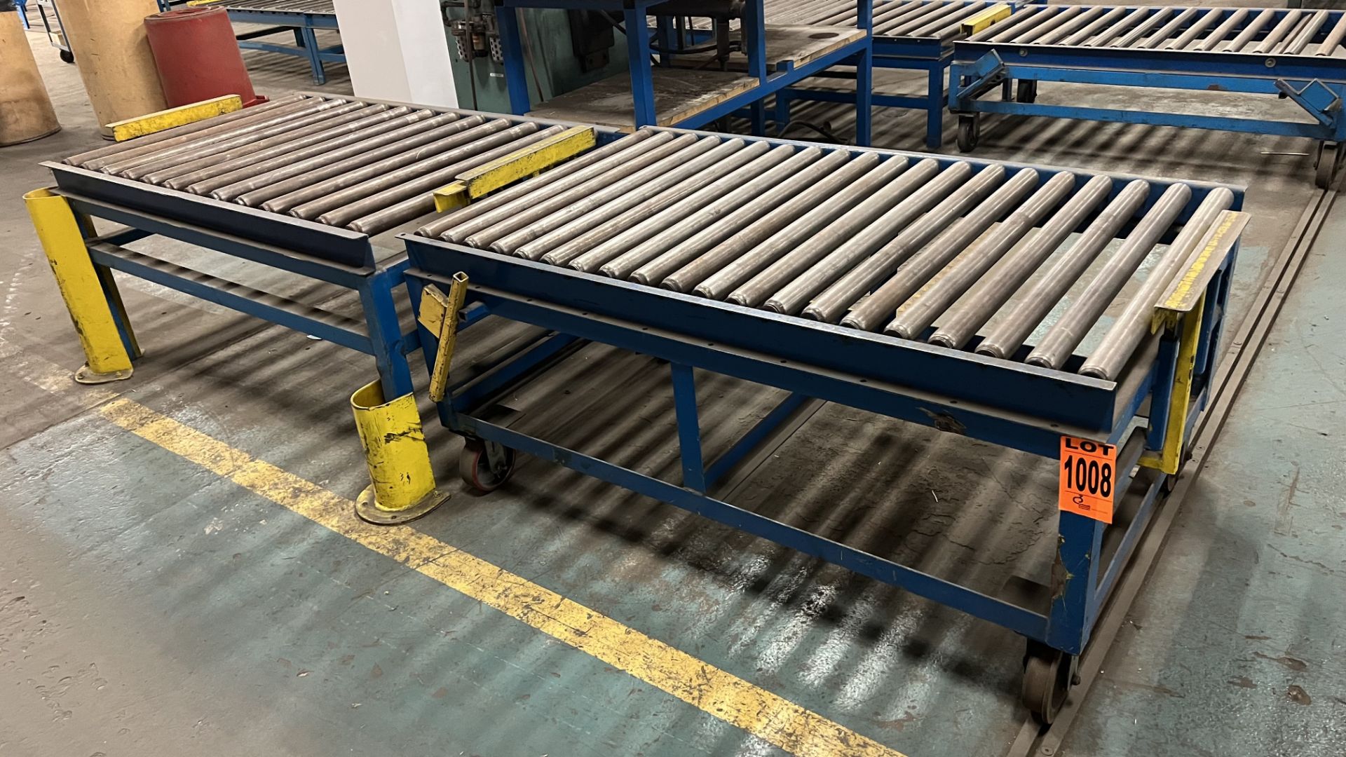 Lot of steel frame mobile conveyor unit w/ 2 rail wheels and 2-casters, w/ pull-up bumper bar AND (1