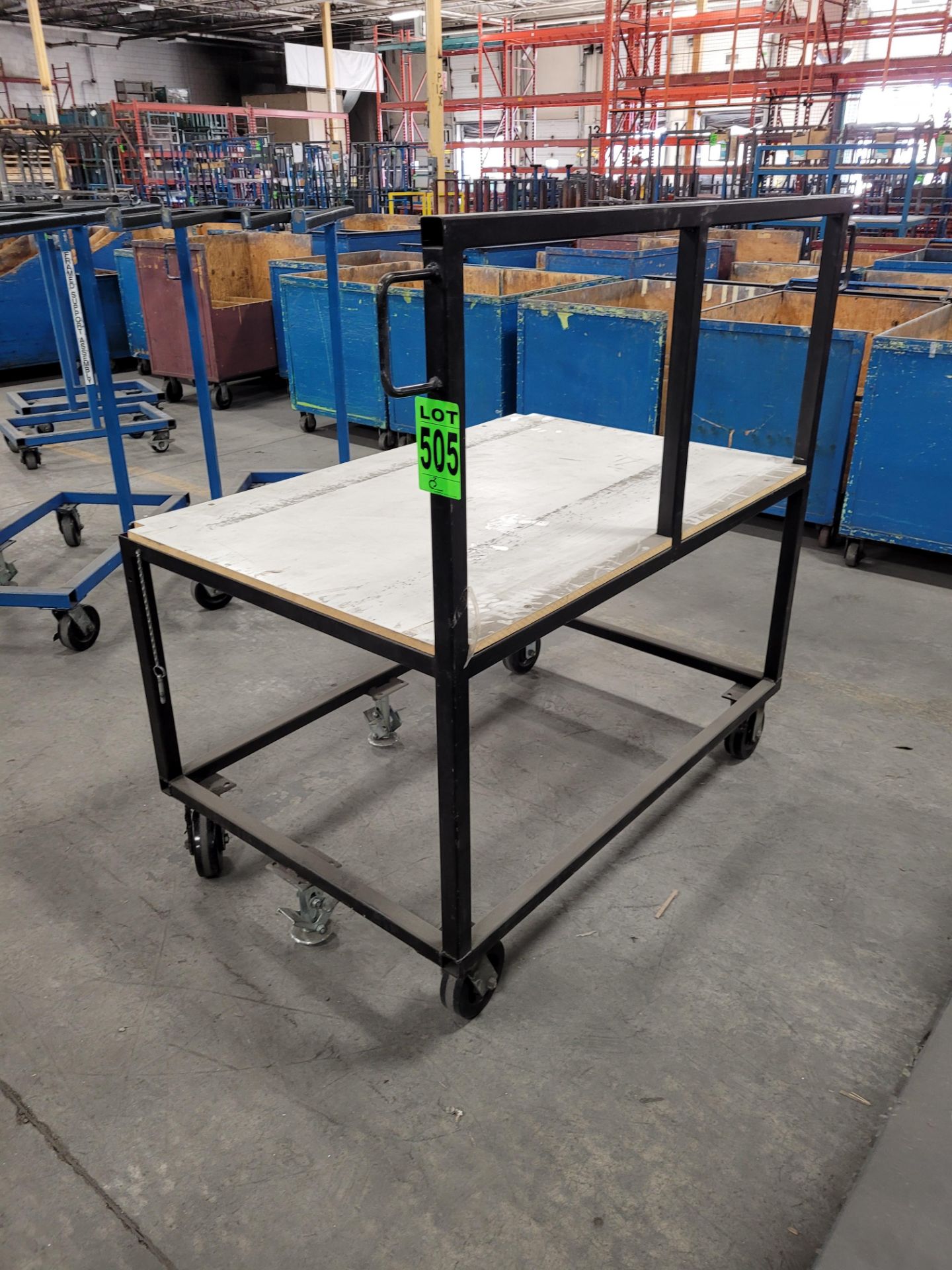 Mobile steel frame worktable with handle, on casters, w/ floor locks, plywood surface - Image 3 of 3