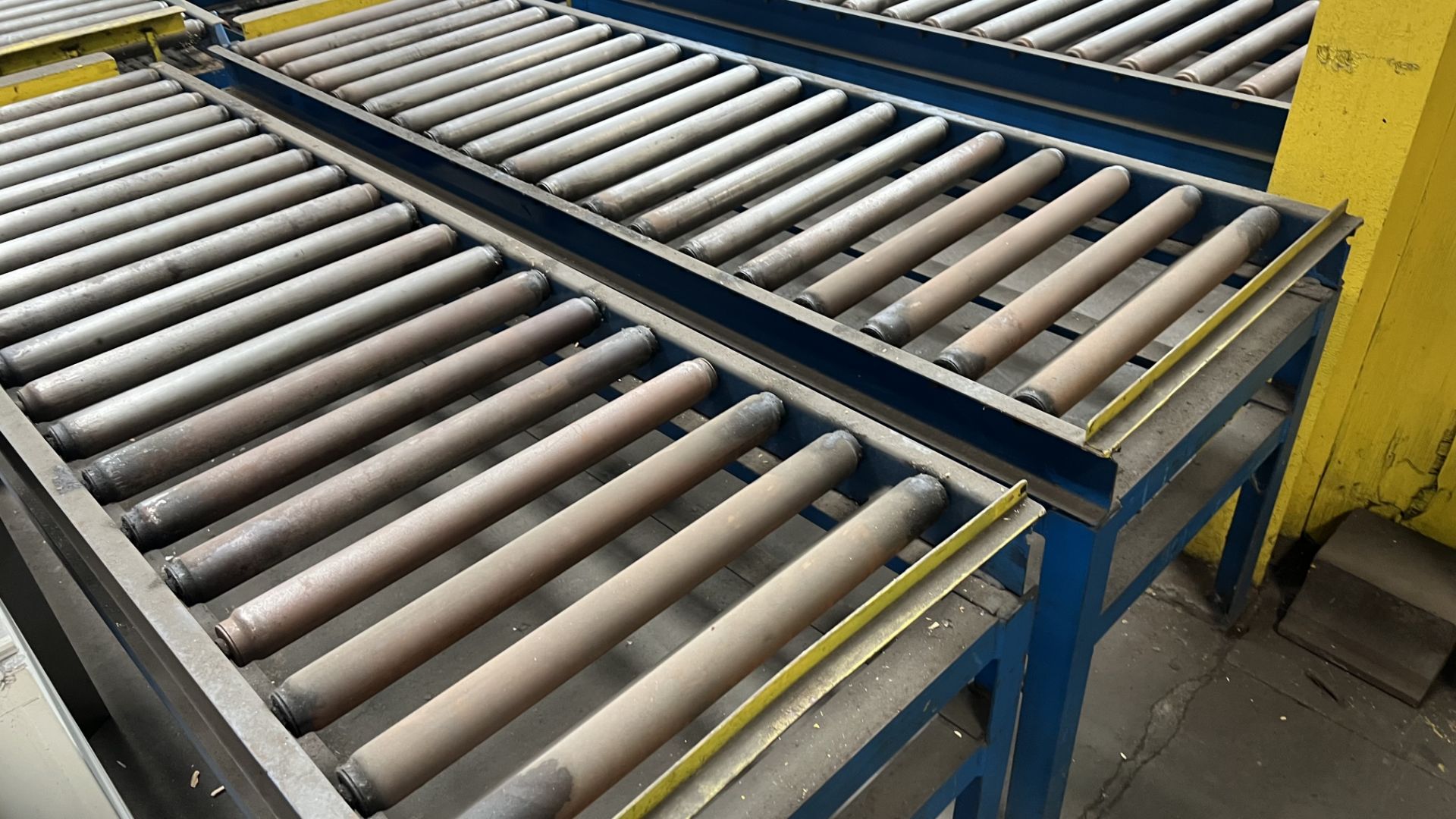 Lot of (9) steel frame fixed manual roller conveyor sections w/ adj/ bumper bars - Image 2 of 5