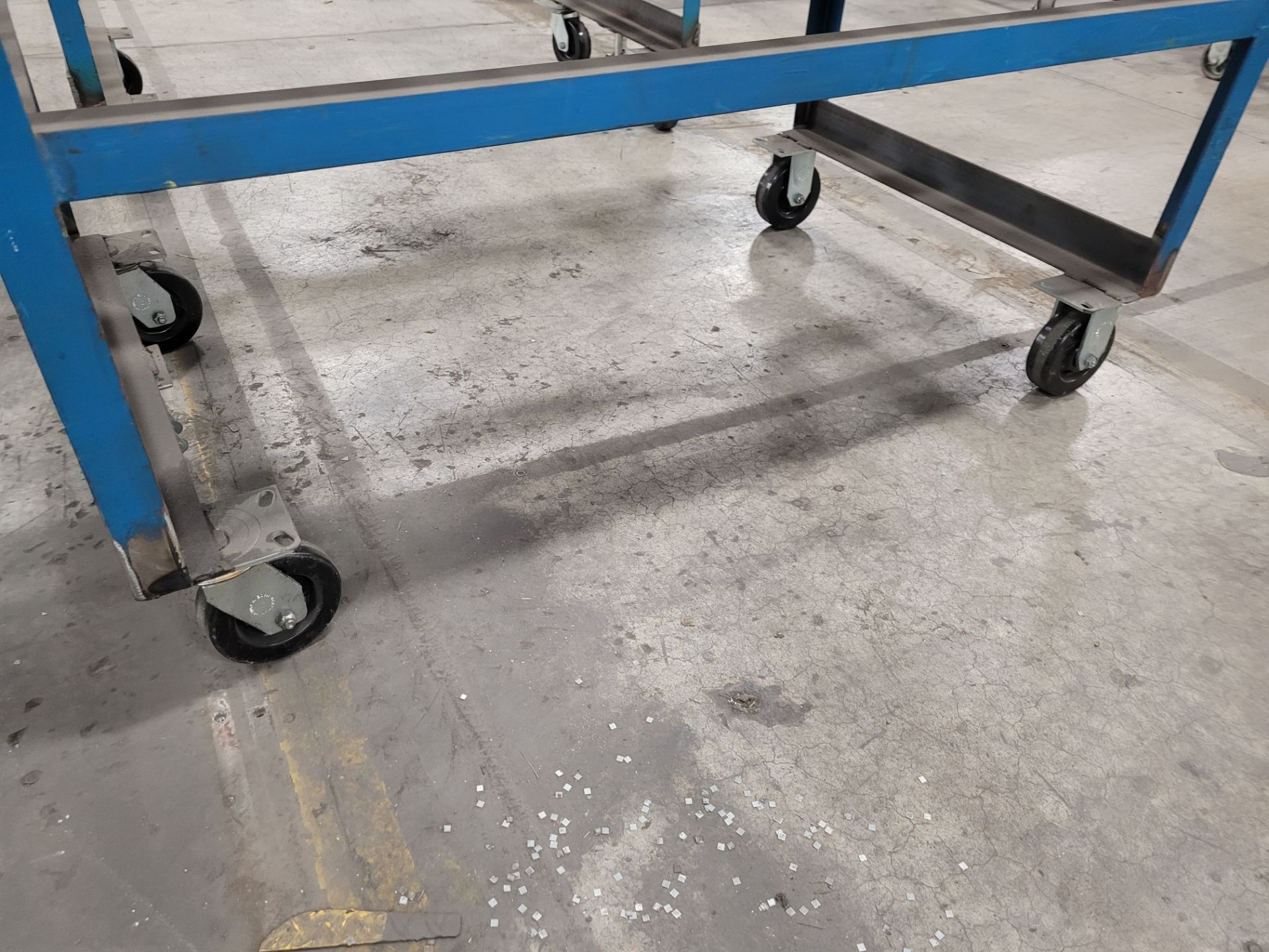 Mobile roller conveyor on casters w/floor lock and (2) adjustable steel backstops - Image 4 of 4