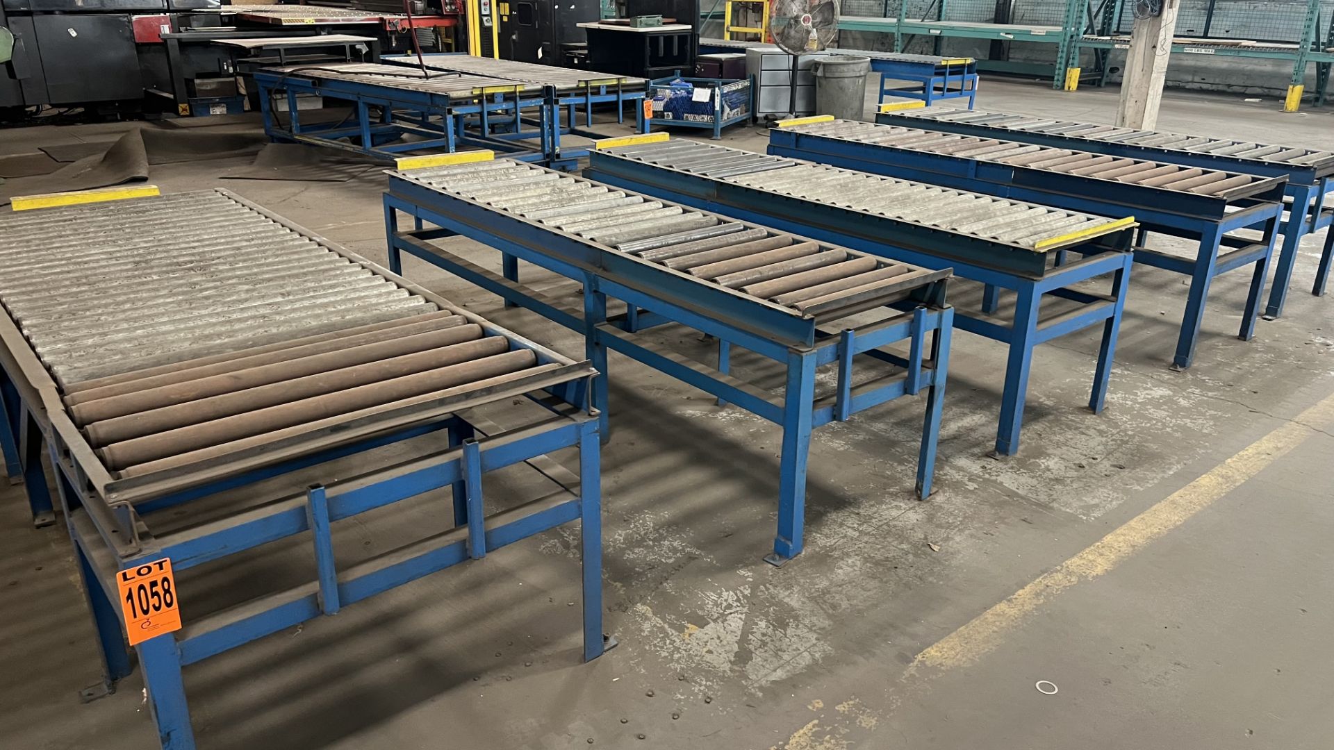 Lot of (5) steel fixed frame manual roller conveyors, various sizes, w/ adj. bumper bars