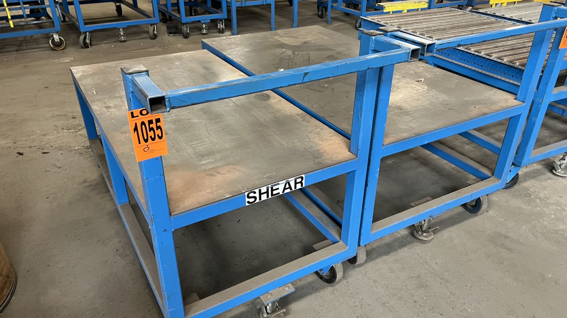 Lot of (2) steel frame platform carts on casters w/ foot lock, handle