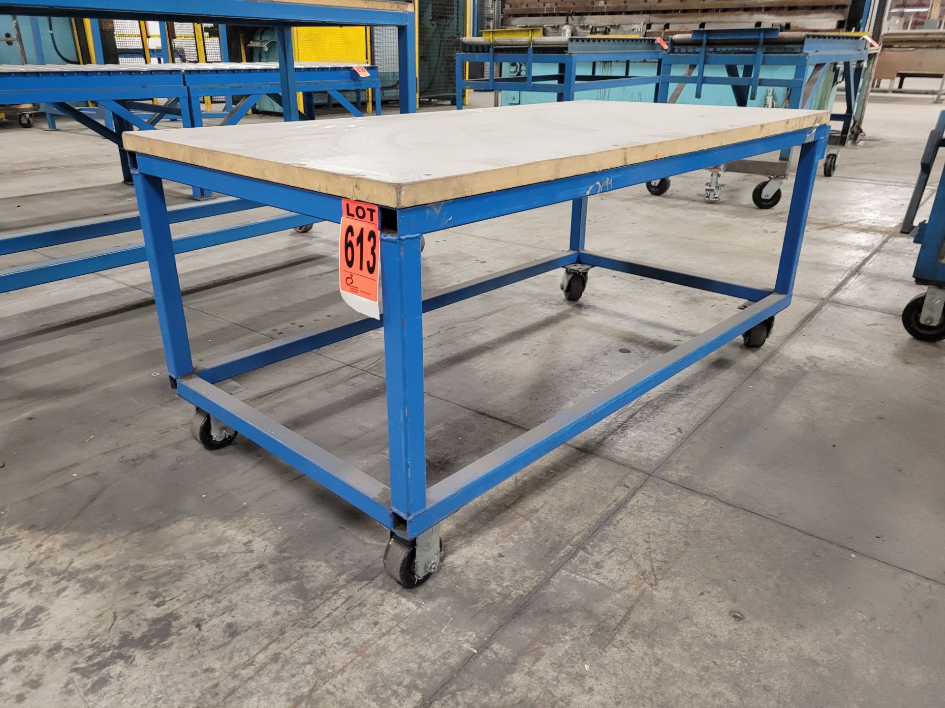Mobile steel frame worktable on casters w/plywood surface - Image 2 of 4