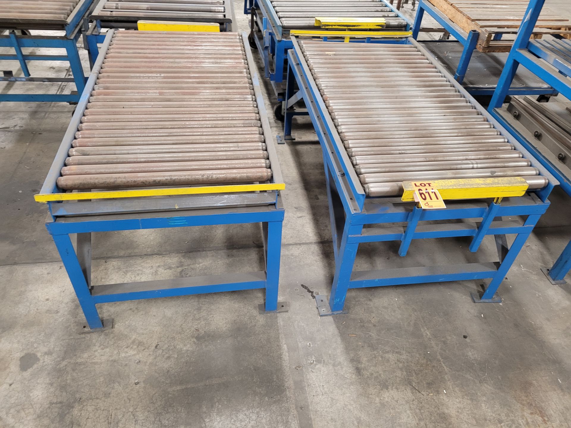 Lot of (2) Heavy-duty steel frame roller conveyors w/adjustable height backstops