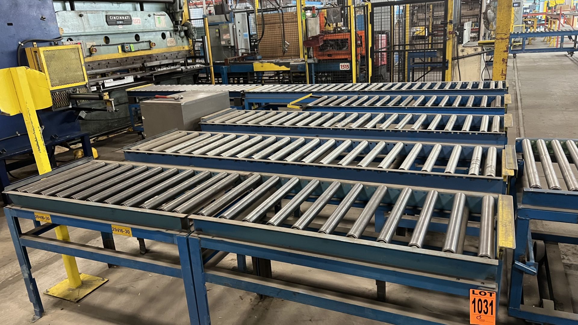 Lot of (6) mobile roller conveyors on steel frames, w/ adjustable bumper bars and incl. (1)mobile ro