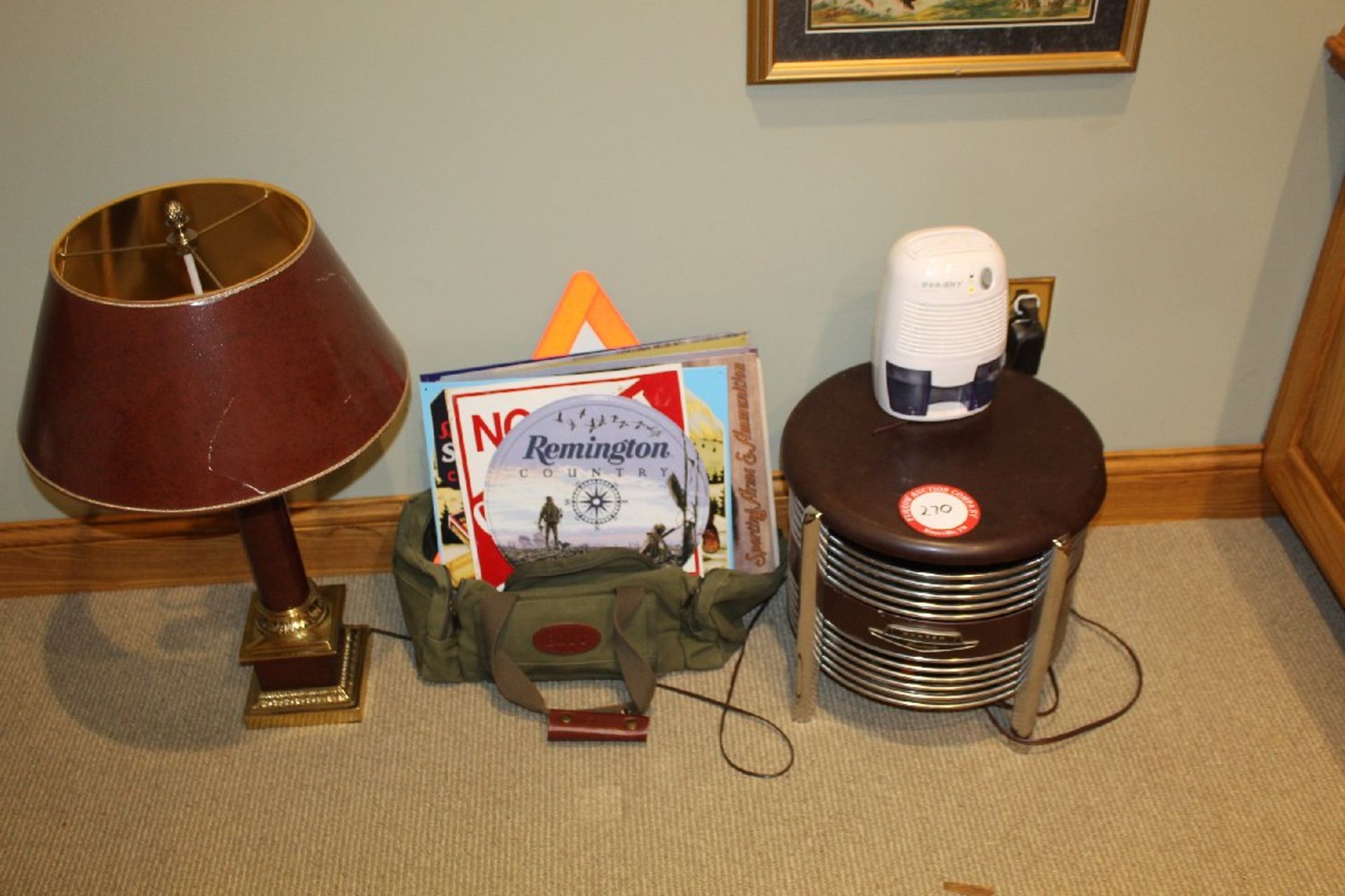 Various Items, Brass Table Lamp with Shade, Duffel Bag, Dehumidifier, Assorted Metal Signs,