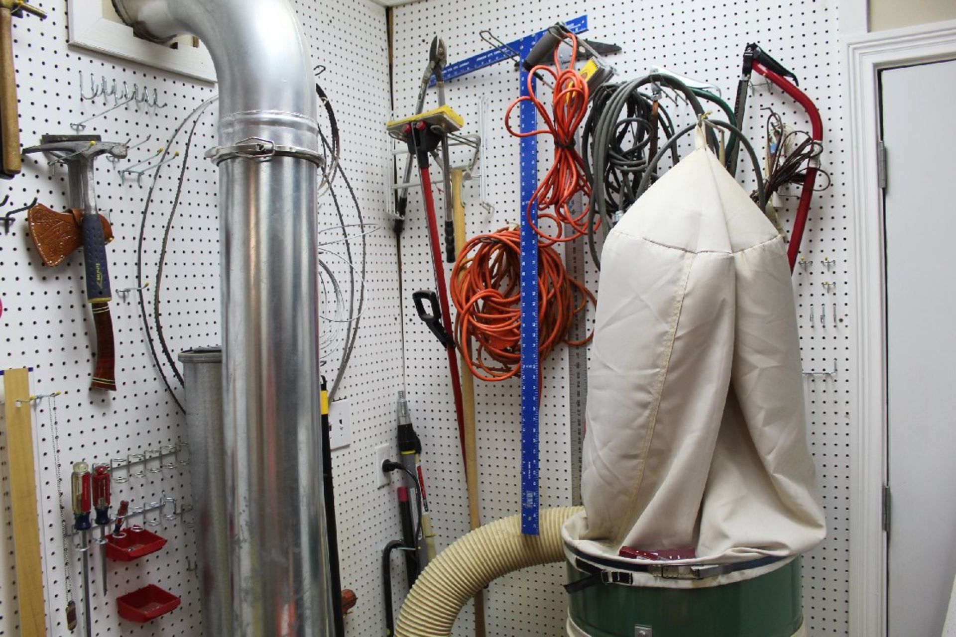 Contents of White Pegboard, Axe, Hammer, Various Power Cords, Squares, Screwdrivers, Saws, etc. - Image 2 of 3