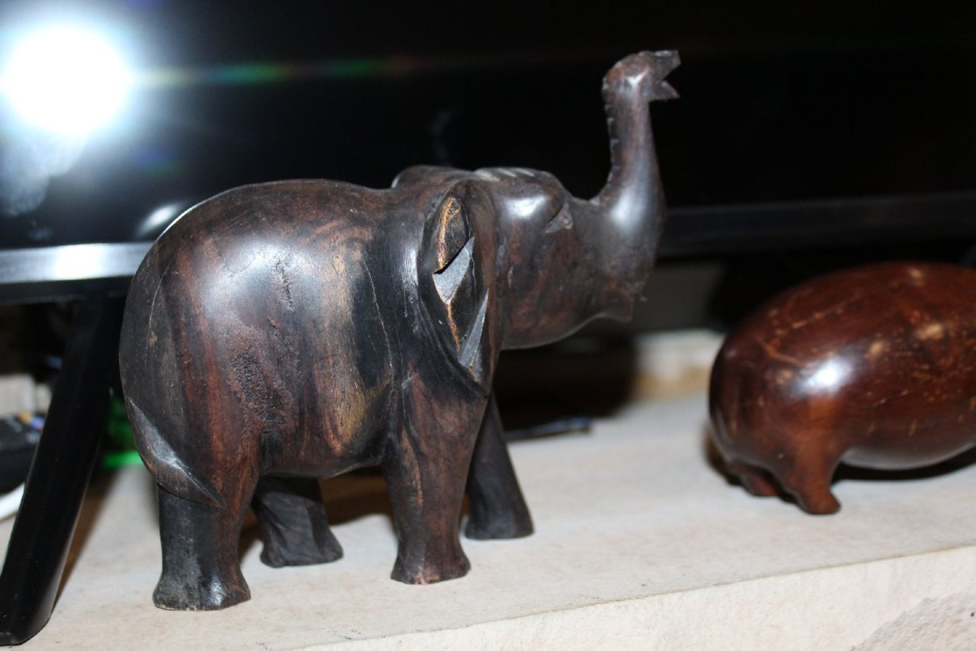 Contents of Fireplace Mantel, Pair of Small Carved Wooden Hippos, Carved Wooden Elephant, Large - Image 2 of 6