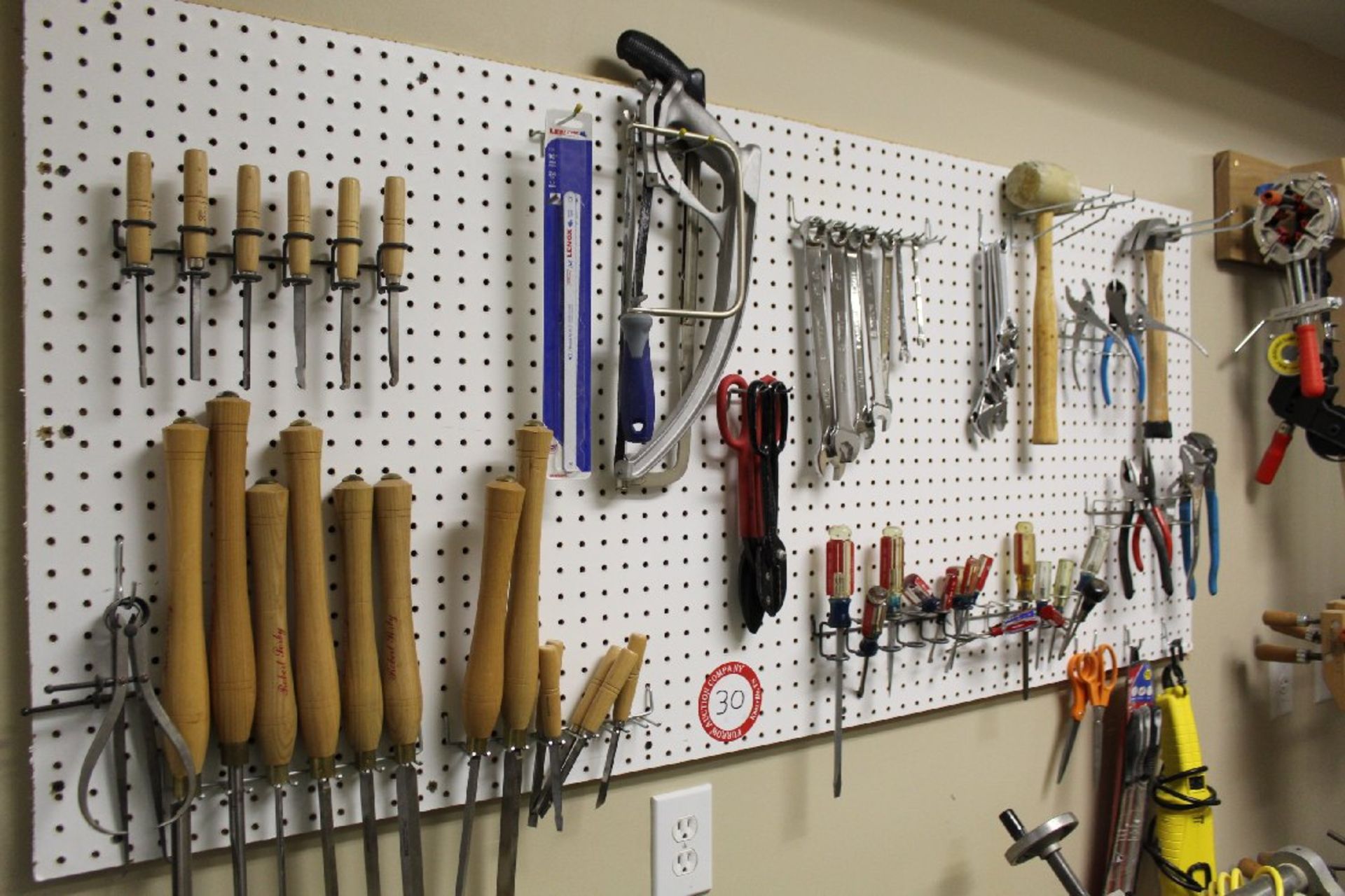 Assorted Hand tools, Chisels, Hammers, Hack Saws, Pliers, Screwdrivers, etc. Everything Hanging on