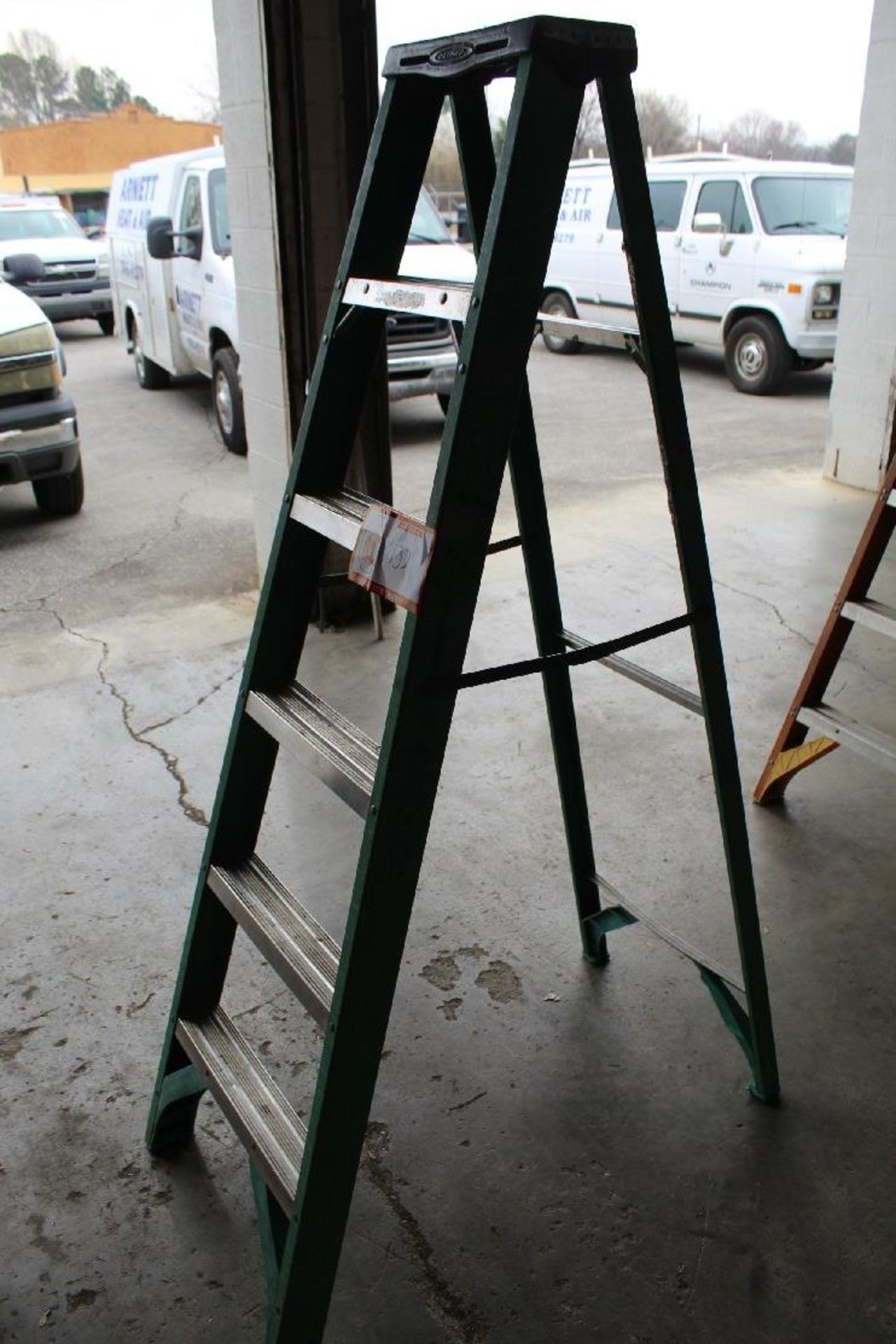 One 6' Fiberglass Step Ladder & One 4' Fiberglass Step Ladder