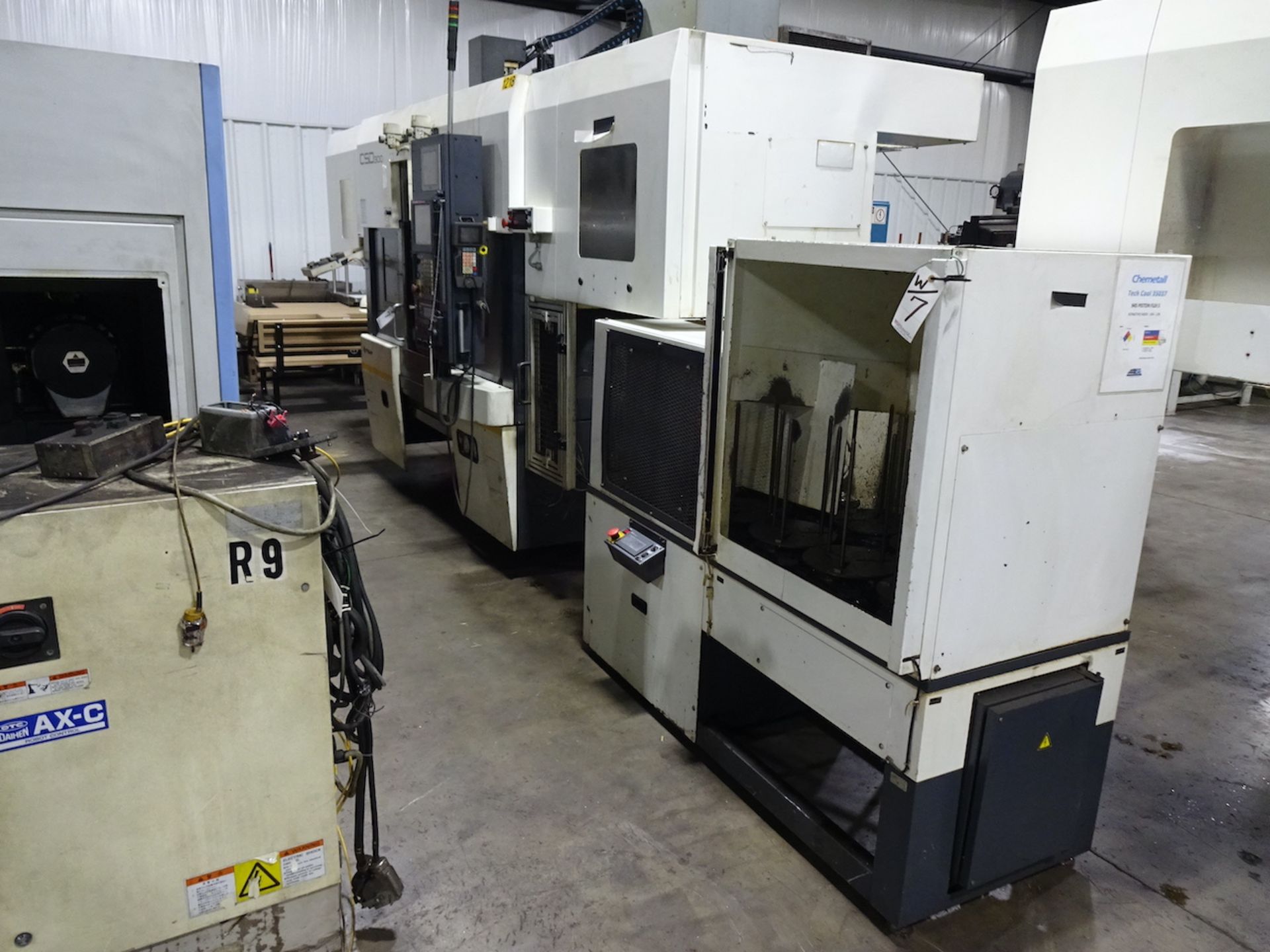 FUJI CSD-300 TWIN SPINDLE CNC LATHE (2014) S/N SE0102377, GANTRY LOAD AND STOCKER TABLE, RECOMMENDED - Image 2 of 25