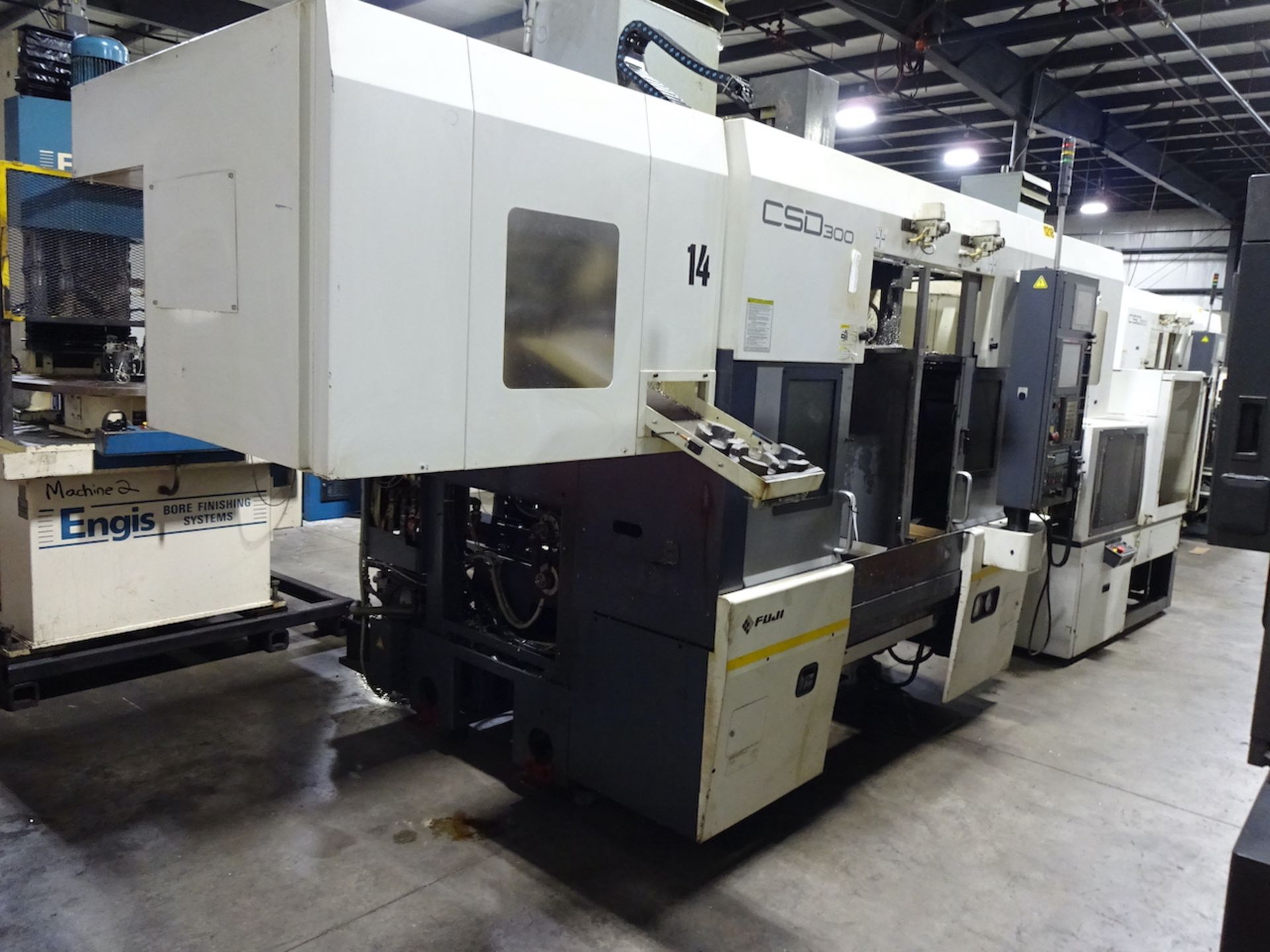 FUJI CSD-300 TWIN SPINDLE CNC LATHE (2014) S/N SE0102377, GANTRY LOAD AND STOCKER TABLE, RECOMMENDED