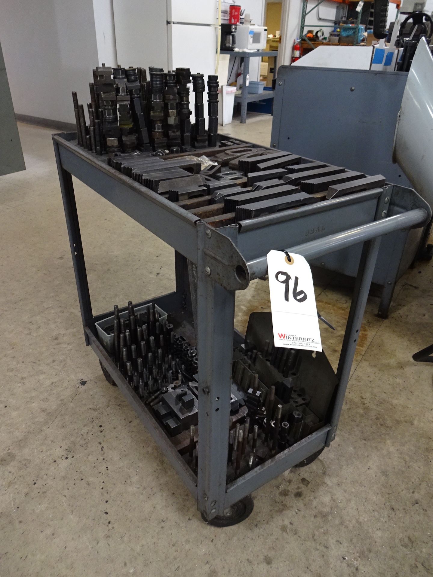 LOT: Assorted Hold Down Equipment (on portable cart & top of cabinet)
