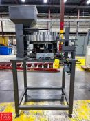 M& S Automated Feeding Systems, Inc. Cap Feeder with Rodix Feeder Cube, Mounted on Table - Rigging F