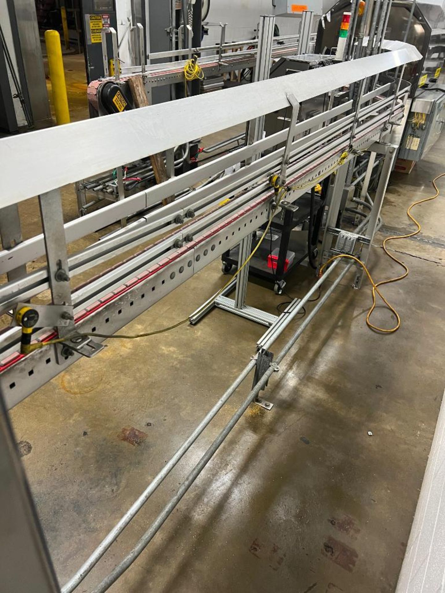 Serpentine S/S Framed Power Conveyor with S/S Hood, Dimensions = 17' x 3.5" - Rigging Fee: $525