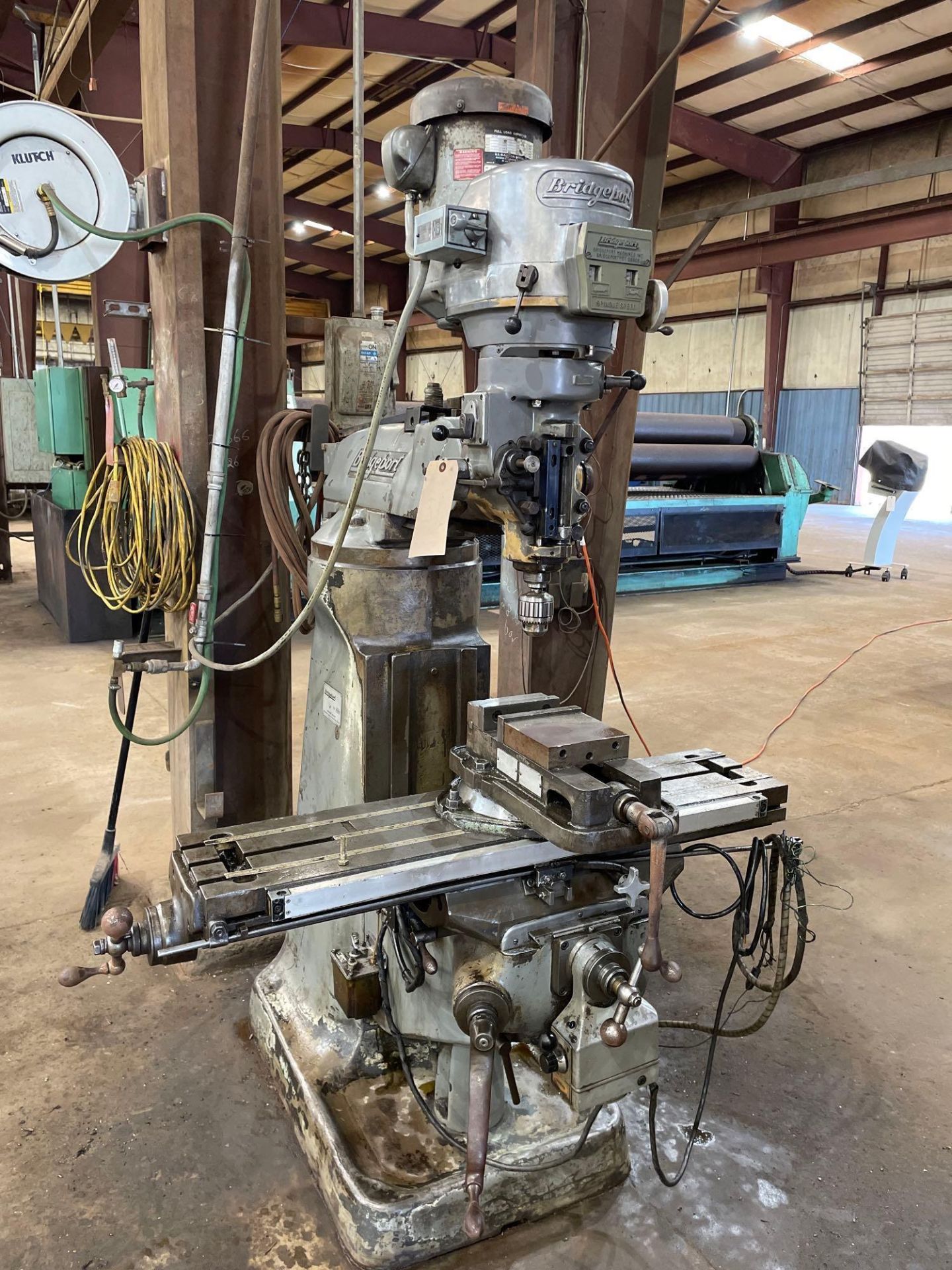 Bridgeport Vertical Mill, with 6” Vise, 40” X 9” Table,