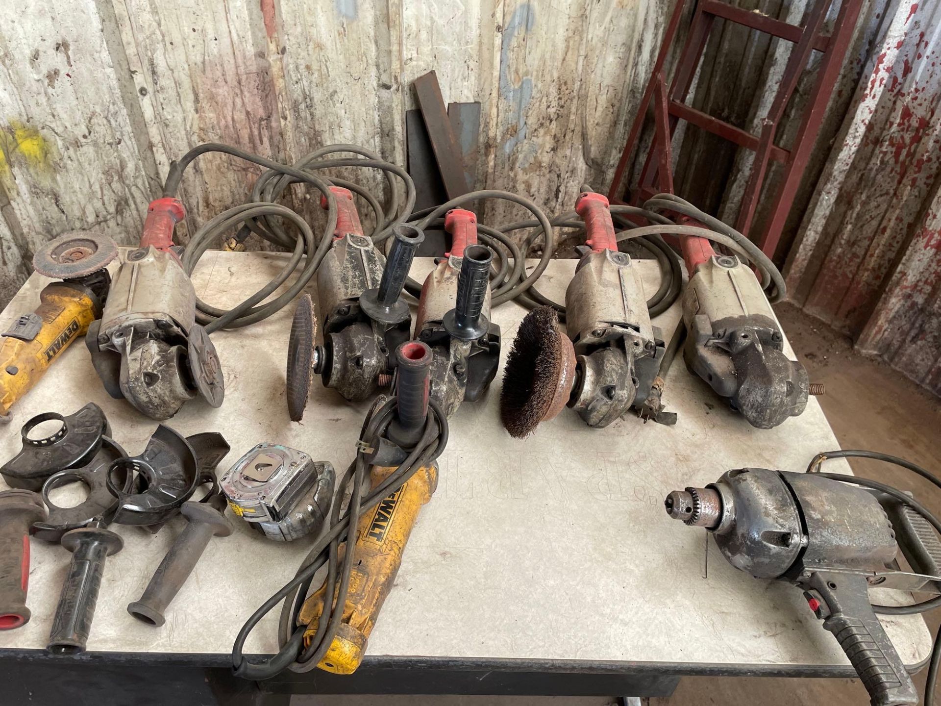Lot of 8 Hand Tools: (7) Angle Grinders, (1) H.D. Drill