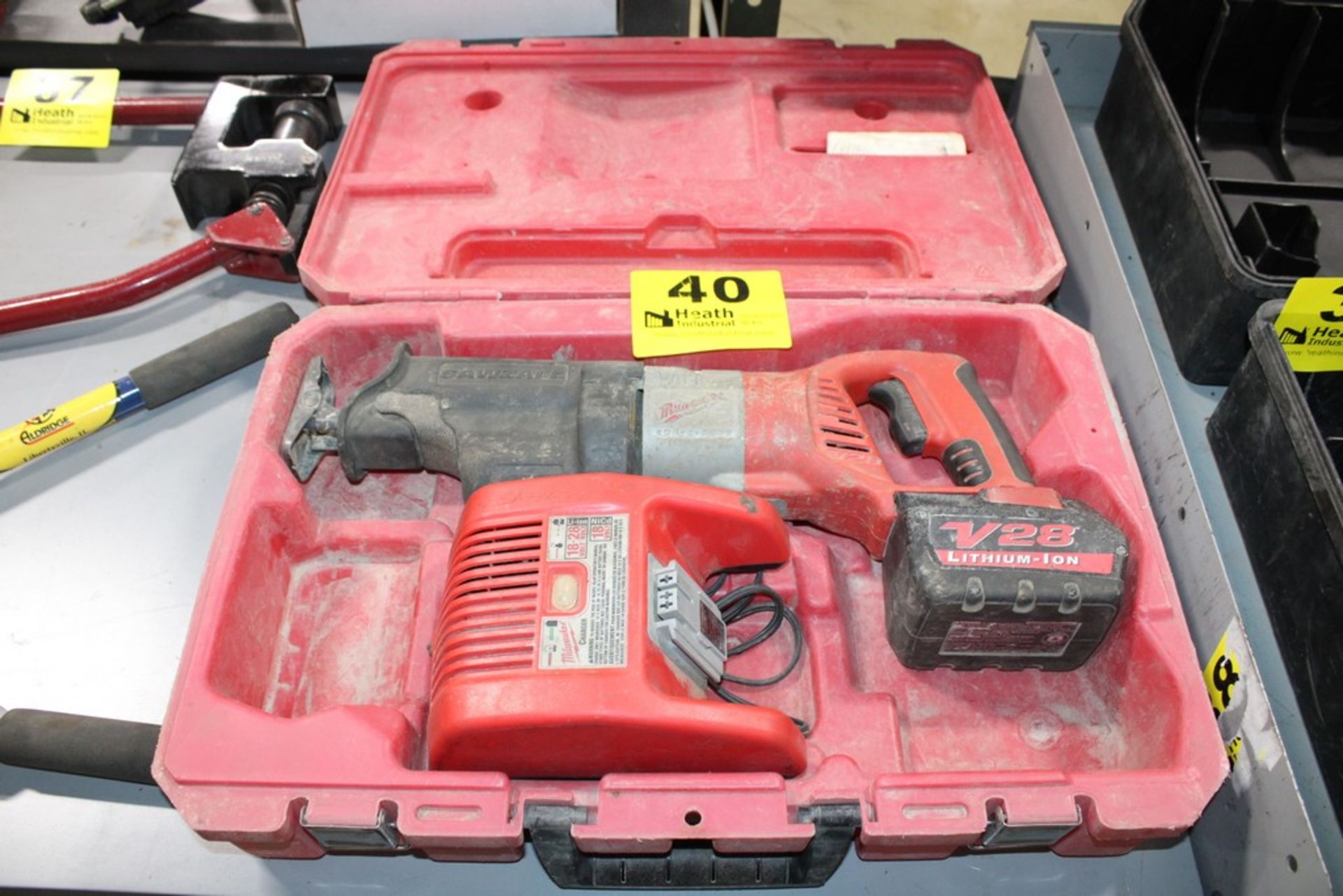 MILWAUKEE MODEL V28 CORDLESS SAWZALL W/ BATTERY AND CHARGER