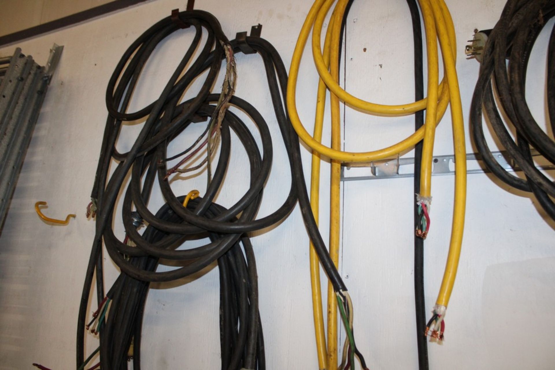 ASSORTED ELECTRICAL CORDS ON WALL - Image 3 of 4