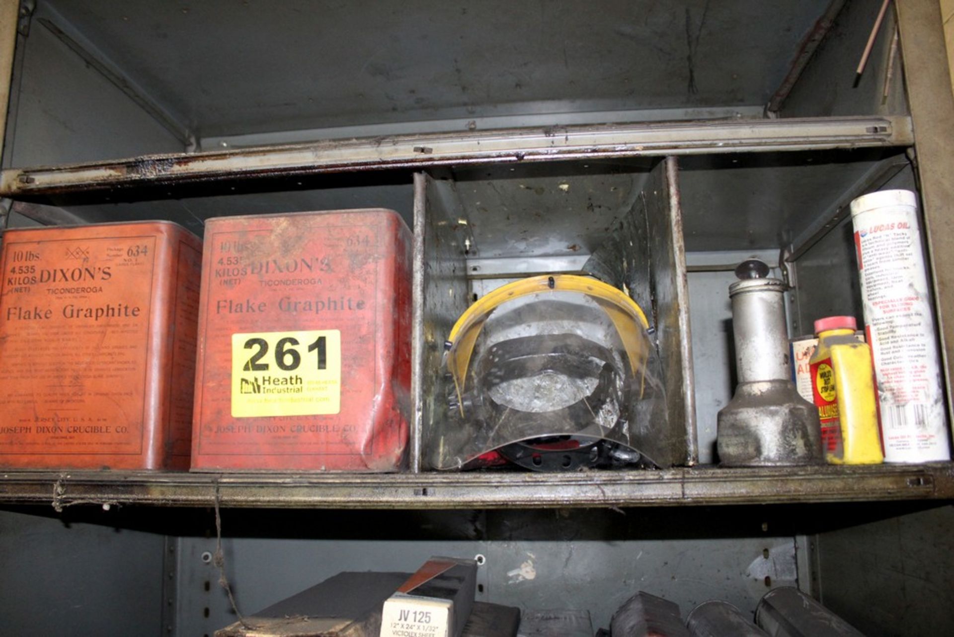 Contents of Shelf Including Dixon Flake Graphite and Assorted Items