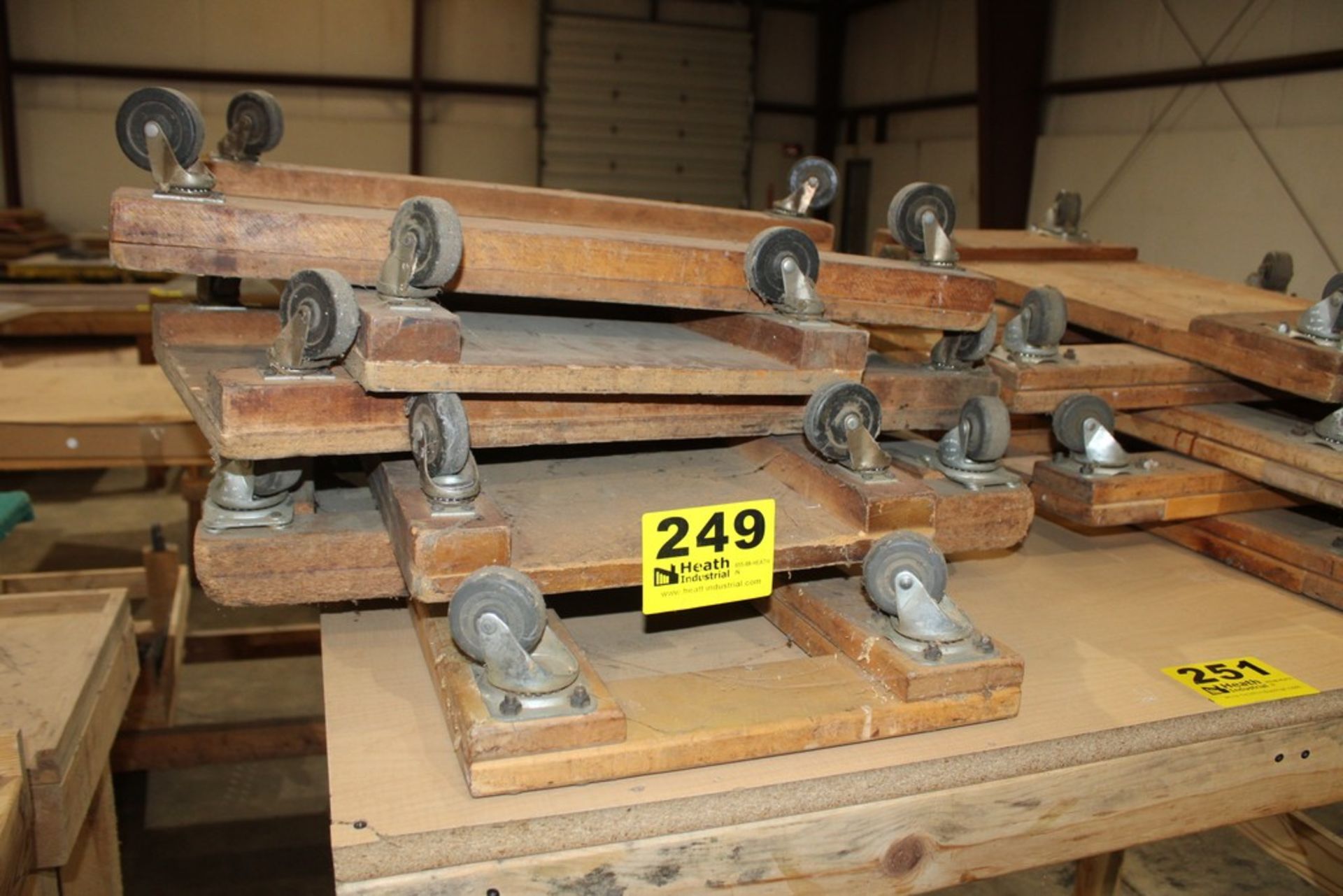 (6) FOUR WHEEL WOOD DOLLIES