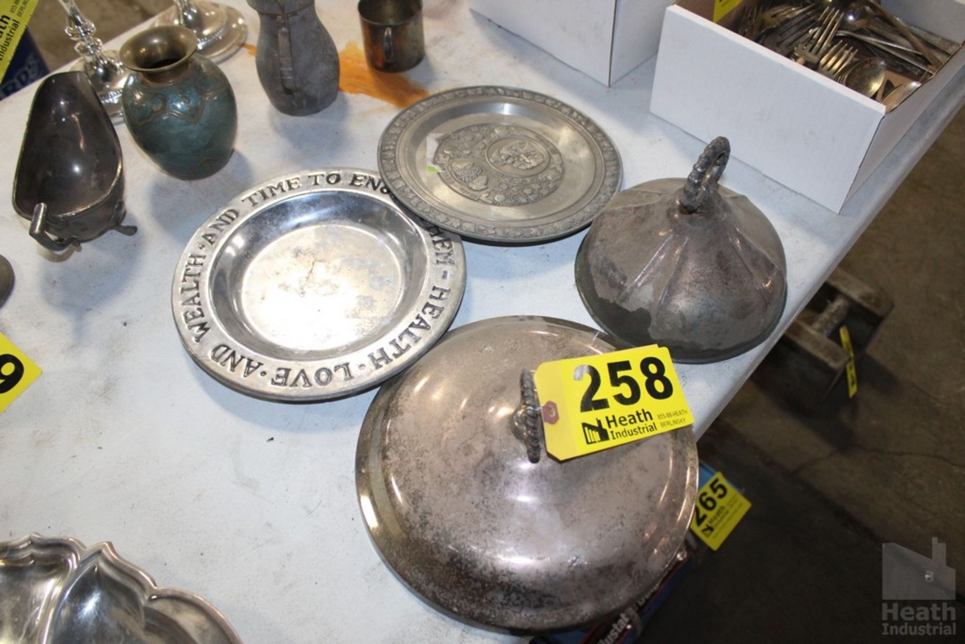 (2) LIDS AND TWO PLATES. LIDS MAY CONTAIN SILVER, NO CLEAR MARKINGS