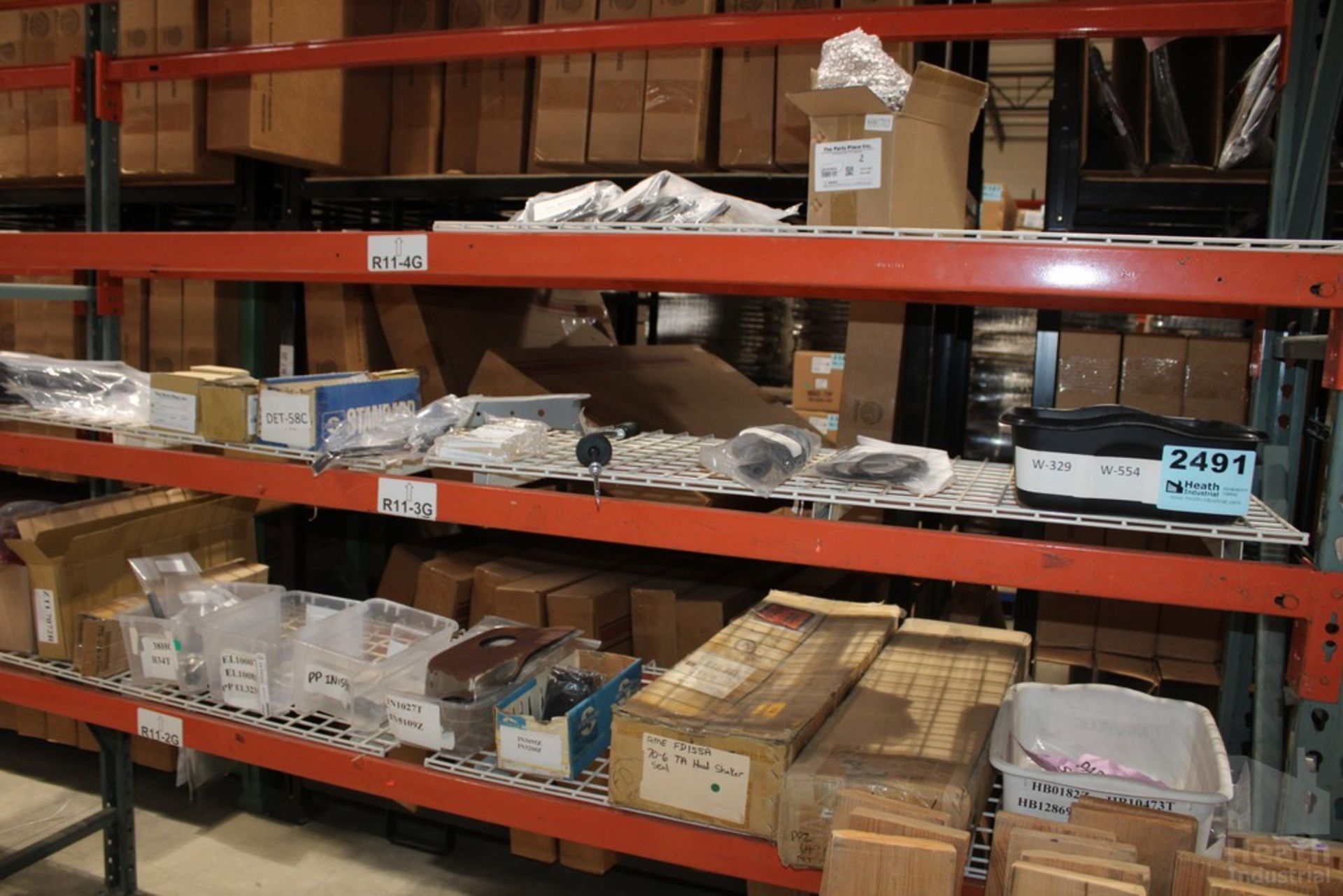 PARTS ON SHELVES, INCLUDING SHIFT CABLE, 1964-1967 GM POWER WINDOW WIRING BOOTS, 1969-1972 CUTLASS