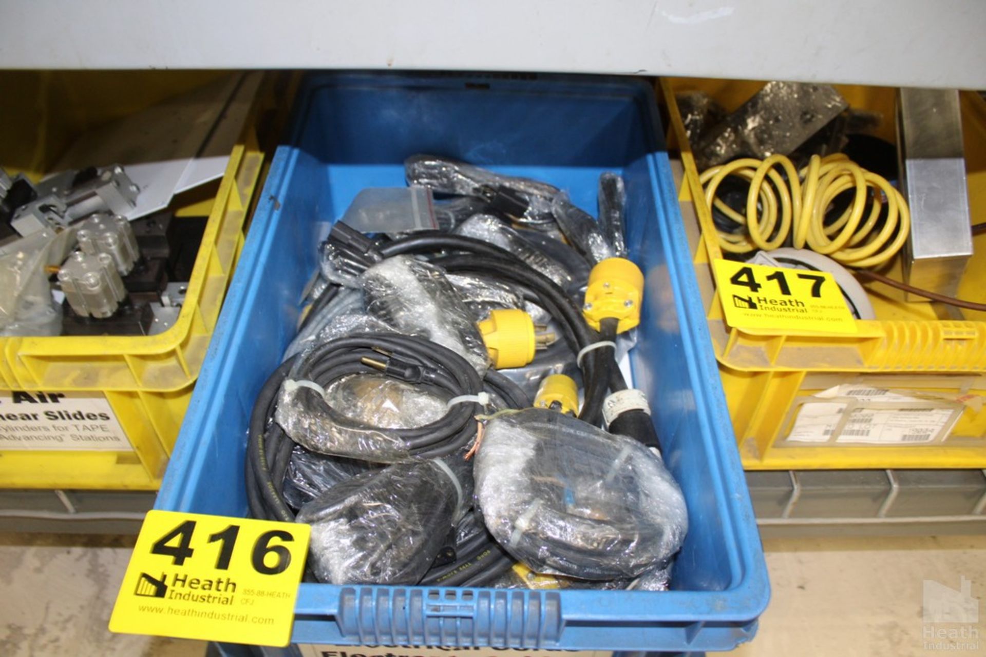 ASSORTED ELECTRICAL CORDS IN BIN