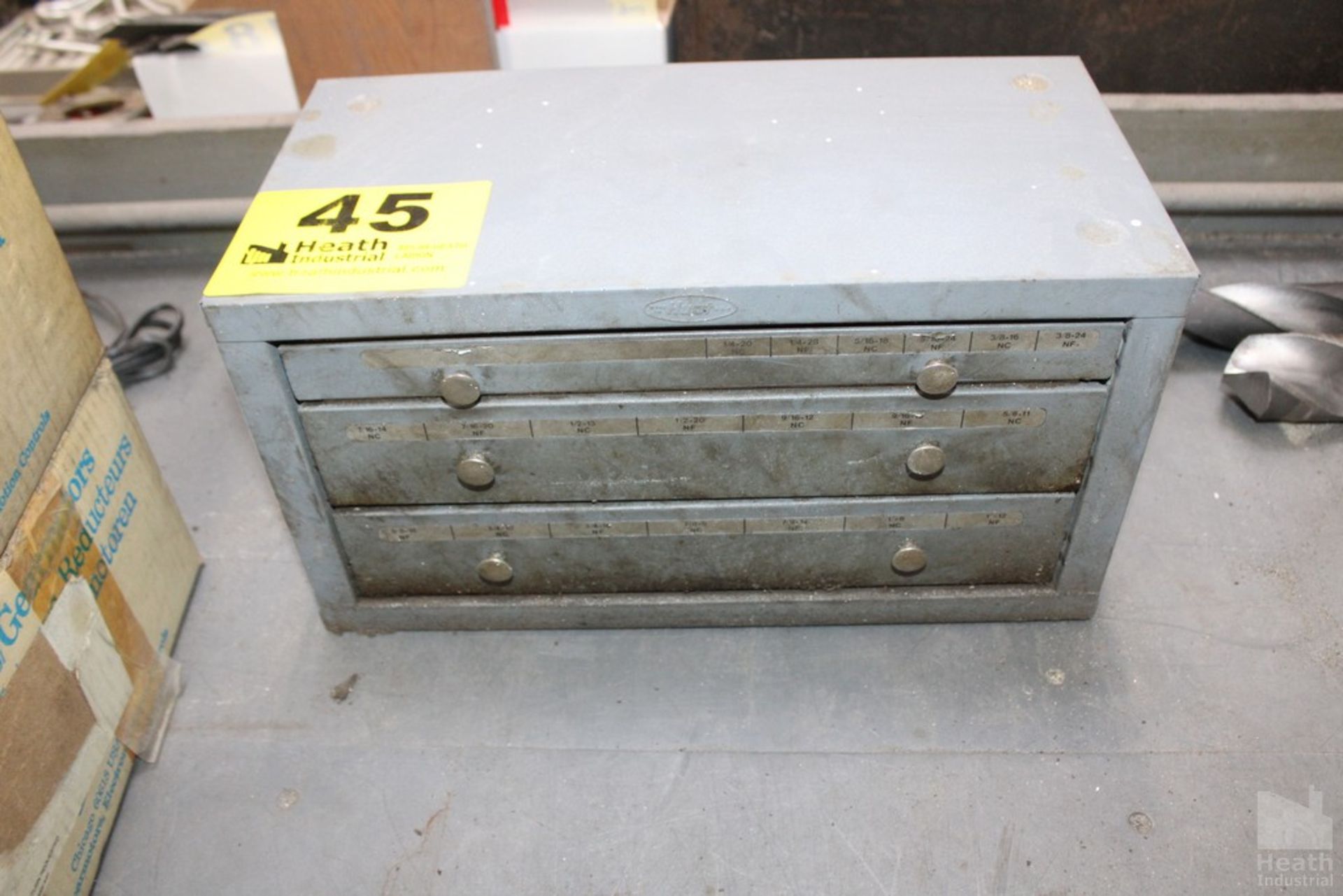 HOUT THREE DRAWER CABINET WITH TAPS 15" X 7-1/2" X 7"