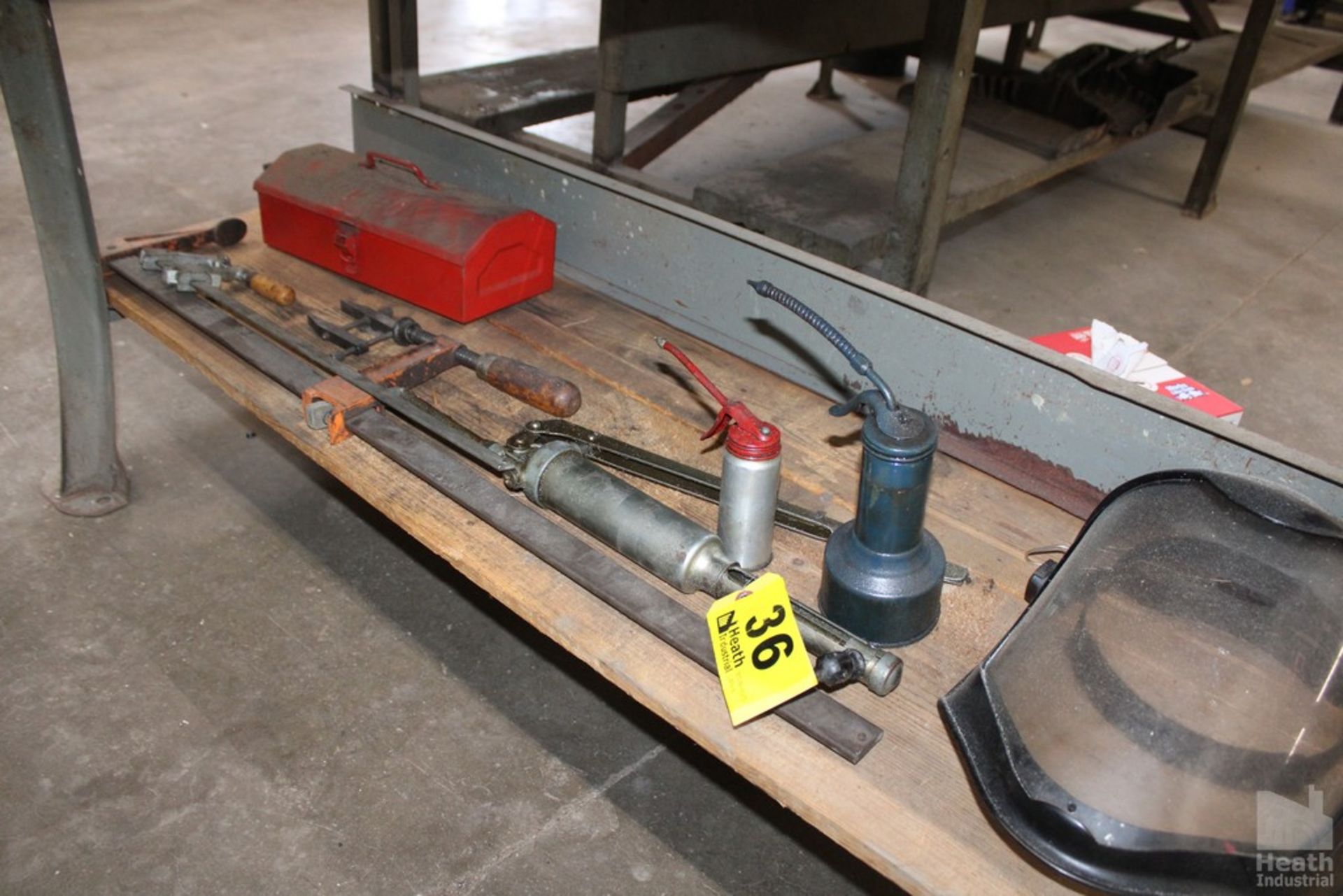 CLAMPS, GREASE GUN, TOOL BOX, OIL CANS AND FACE SHIELD