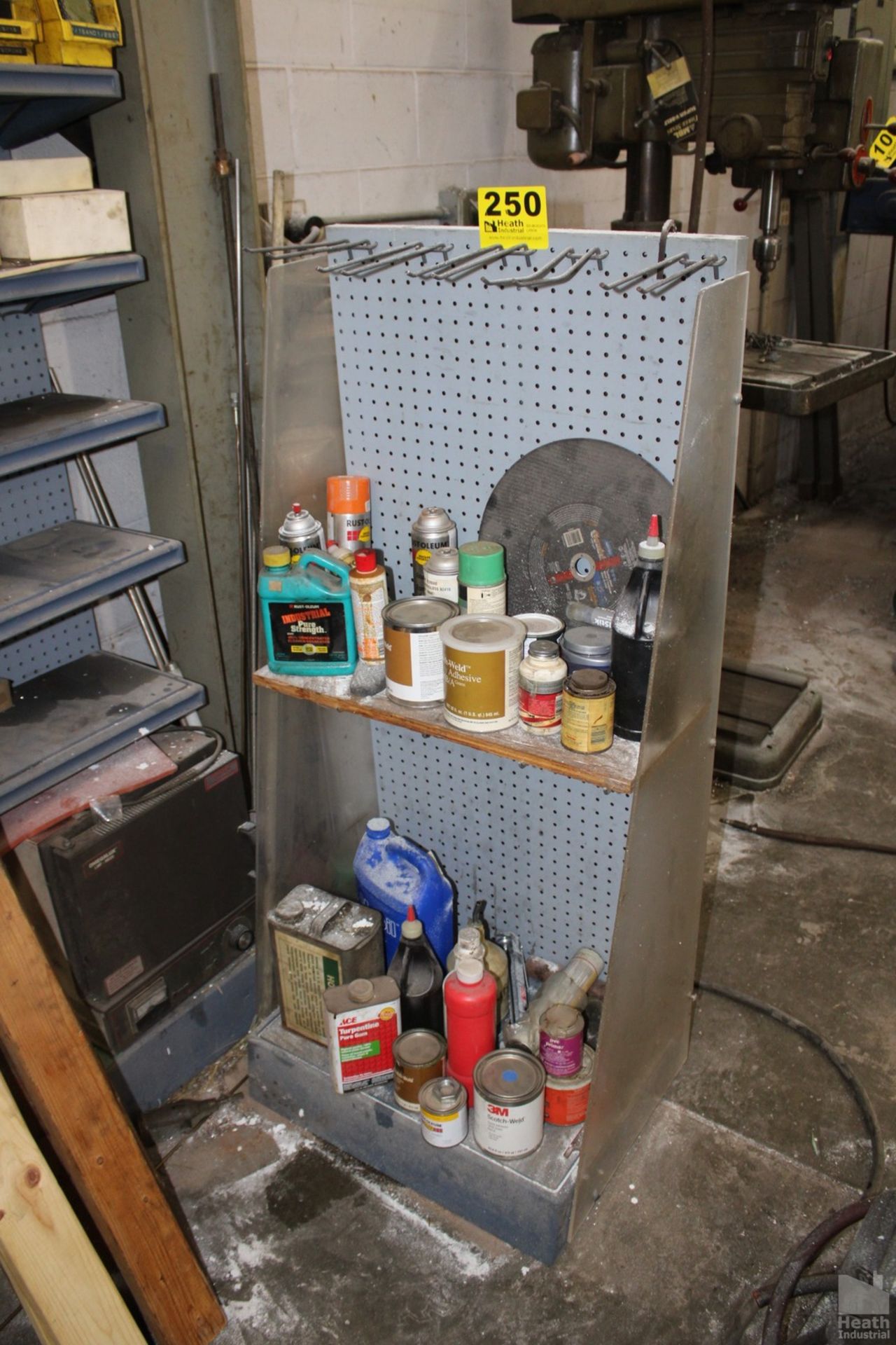 PEG BOARD SHELVING UNIT WITH PAINT AND CHEMICALS