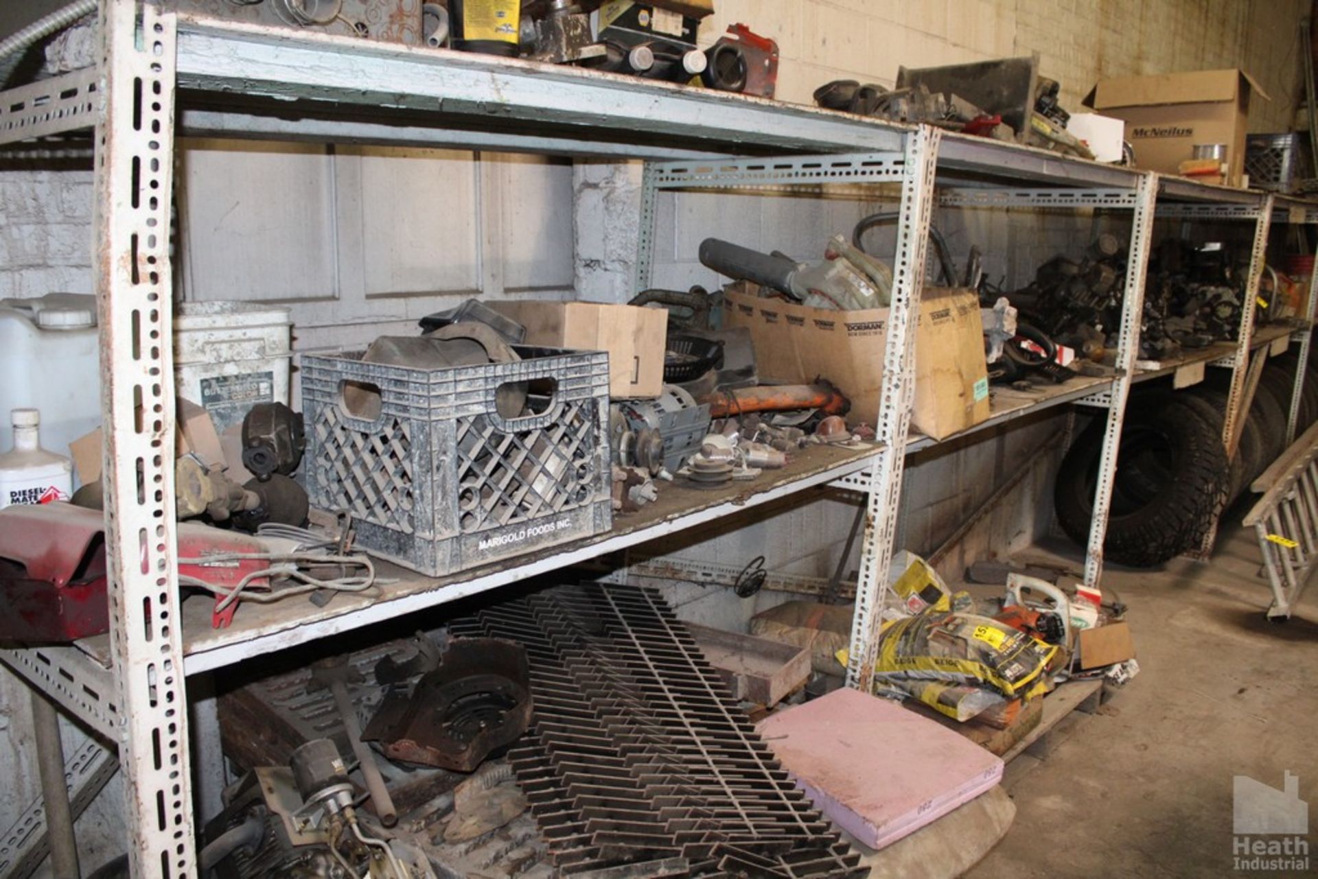 CONTENTS OF SHELVING UNIT WITH MOTORS AND PARTS
