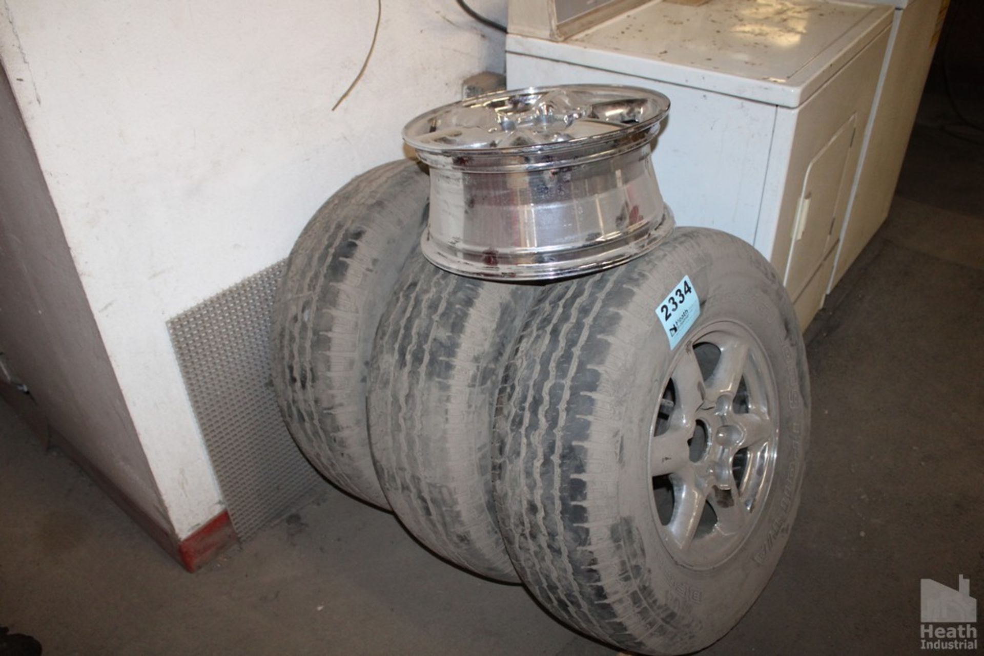 (3) TIRES WITH ONE EXTRA RIM
